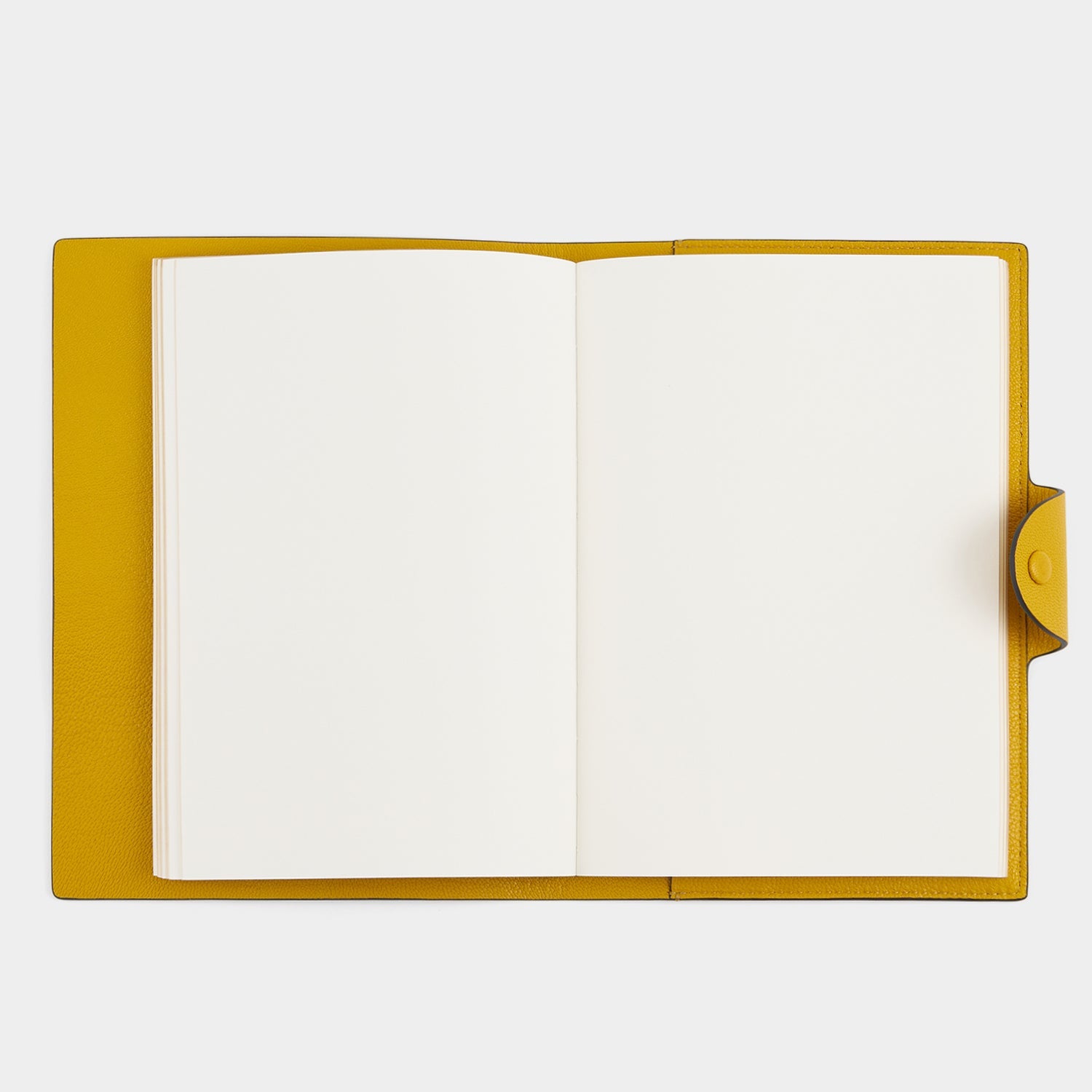 Wink A5 Journal -

          
            Capra Leather in Mustard Yellow -
          

          Anya Hindmarch EU
