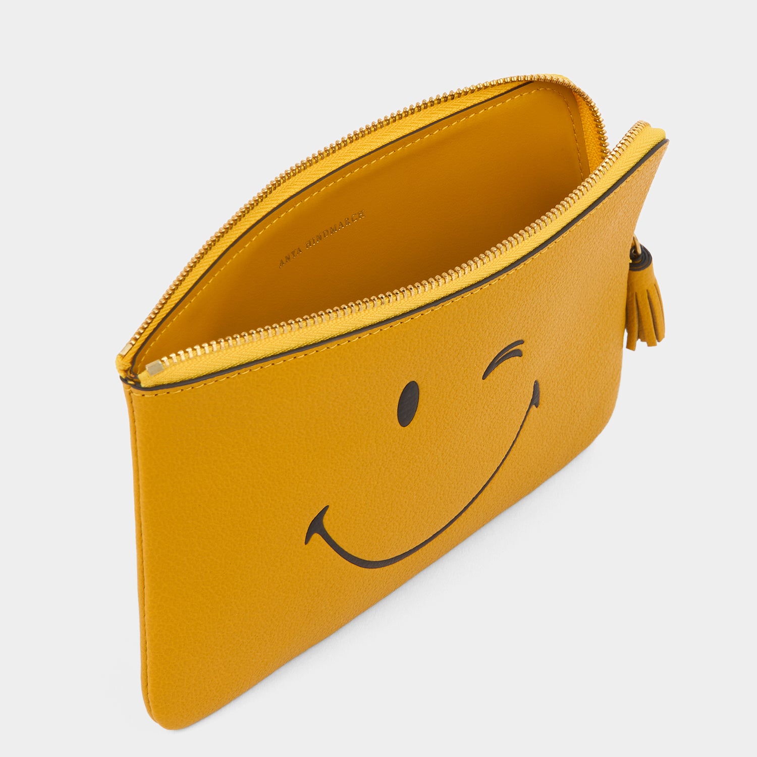 Wink Zip Loose Pocket -

          
            Capra Leather in Mustard Yellow -
          

          Anya Hindmarch EU
