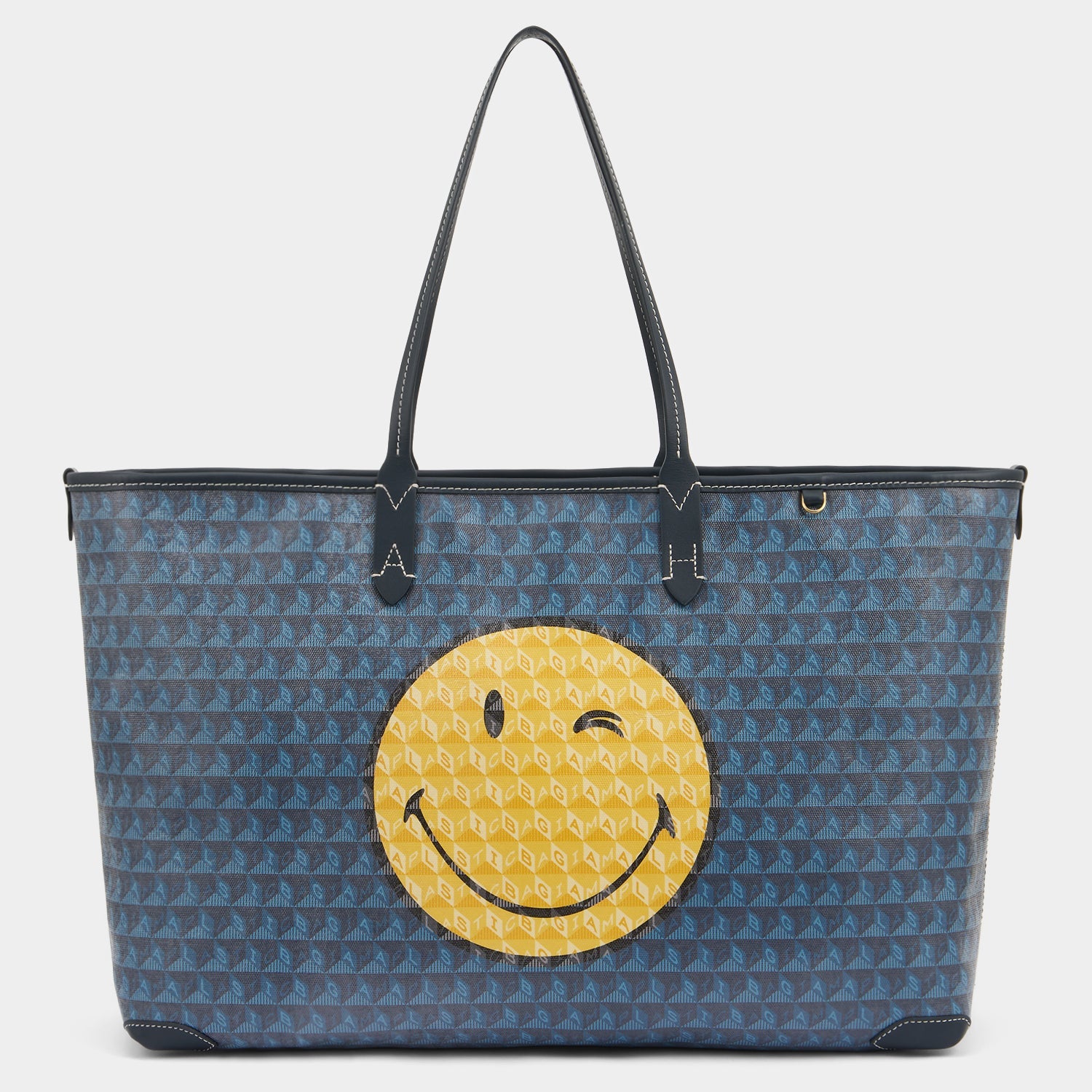 I am a Plastic Bag Wink Zipped Tote -

          
            Recycled Canvas in Marine -
          

          Anya Hindmarch EU
