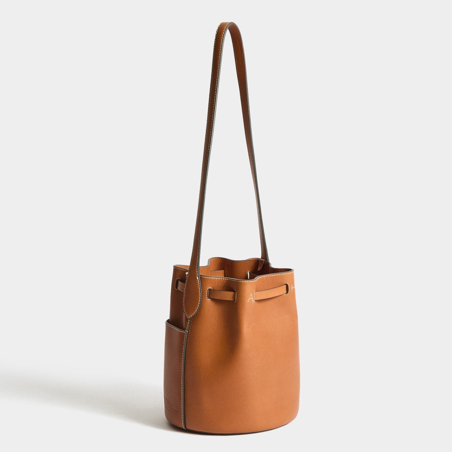 Return To Nature Small Bucket Bag -

          
            Natural Grain Leather in Pecan Brown -
          

          Anya Hindmarch EU
