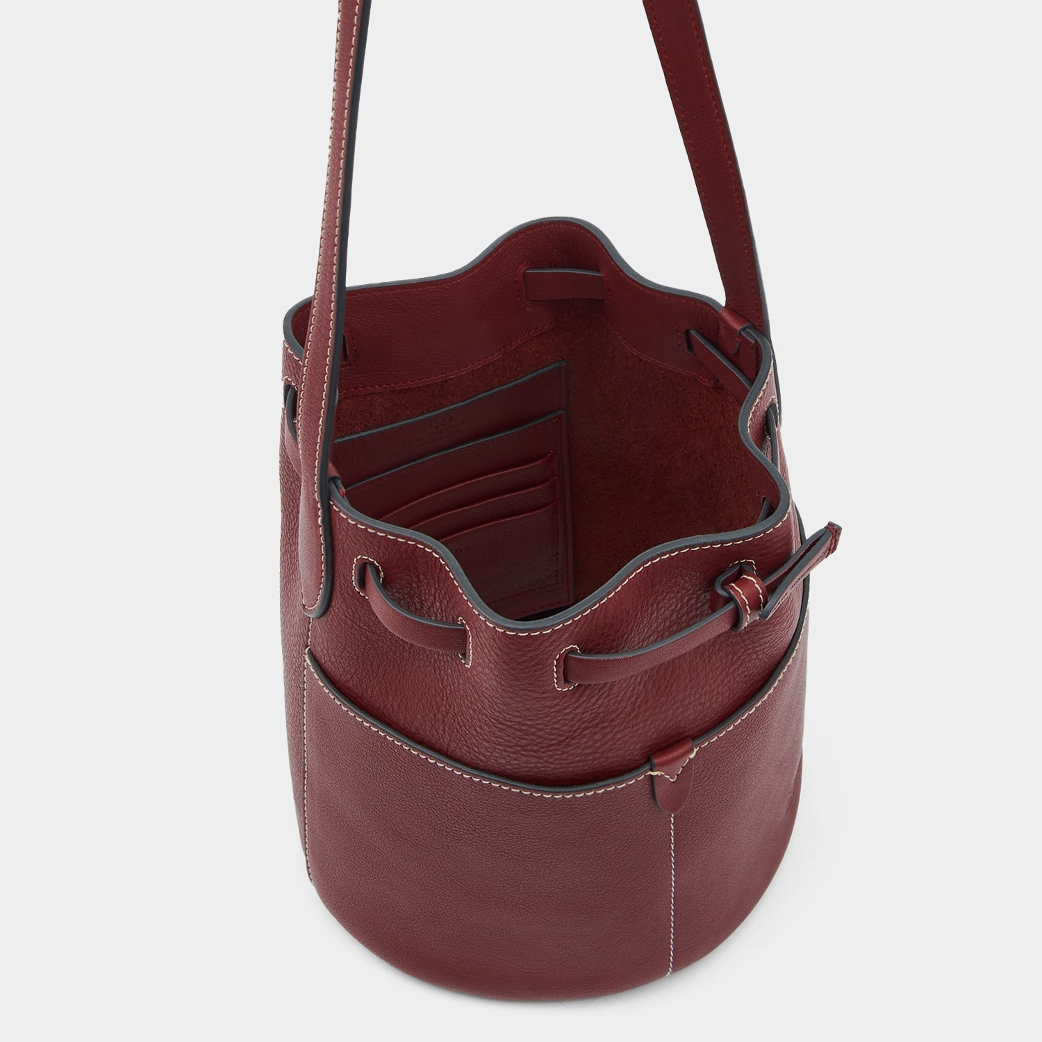 Return to Nature Small Bucket Bag -

          
            Natural Grain Leather in Rosewood Red -
          

          Anya Hindmarch EU
