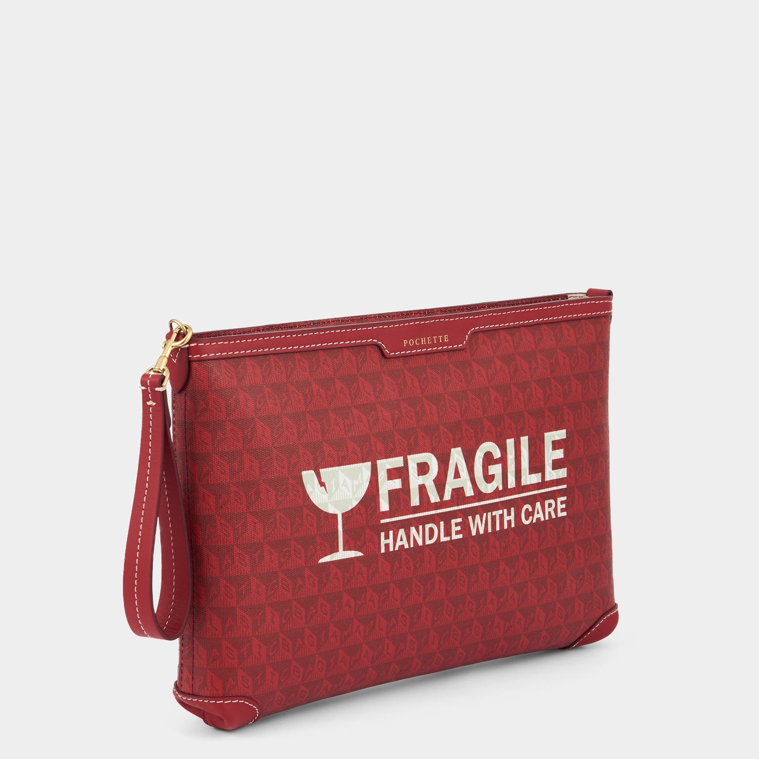 Fragile I am a Plastic Bag Pochette -

          
            Recycled Canvas in Vampire -
          

          Anya Hindmarch EU
