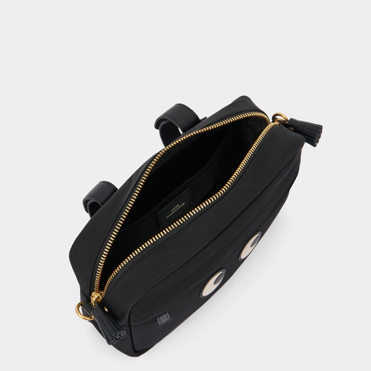 Eyes Handlebar Cross-body -

          
            Regenerated ECONYL® Nylon in Black -
          

          Anya Hindmarch EU
