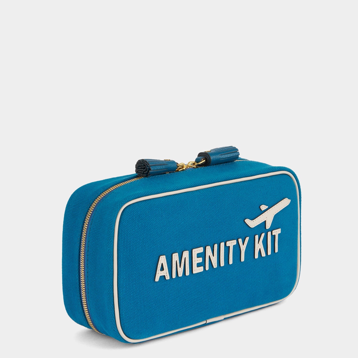 Amenity Kit Pouch -

          
            Recycled Canvas in Light Petrol Blue -
          

          Anya Hindmarch EU
