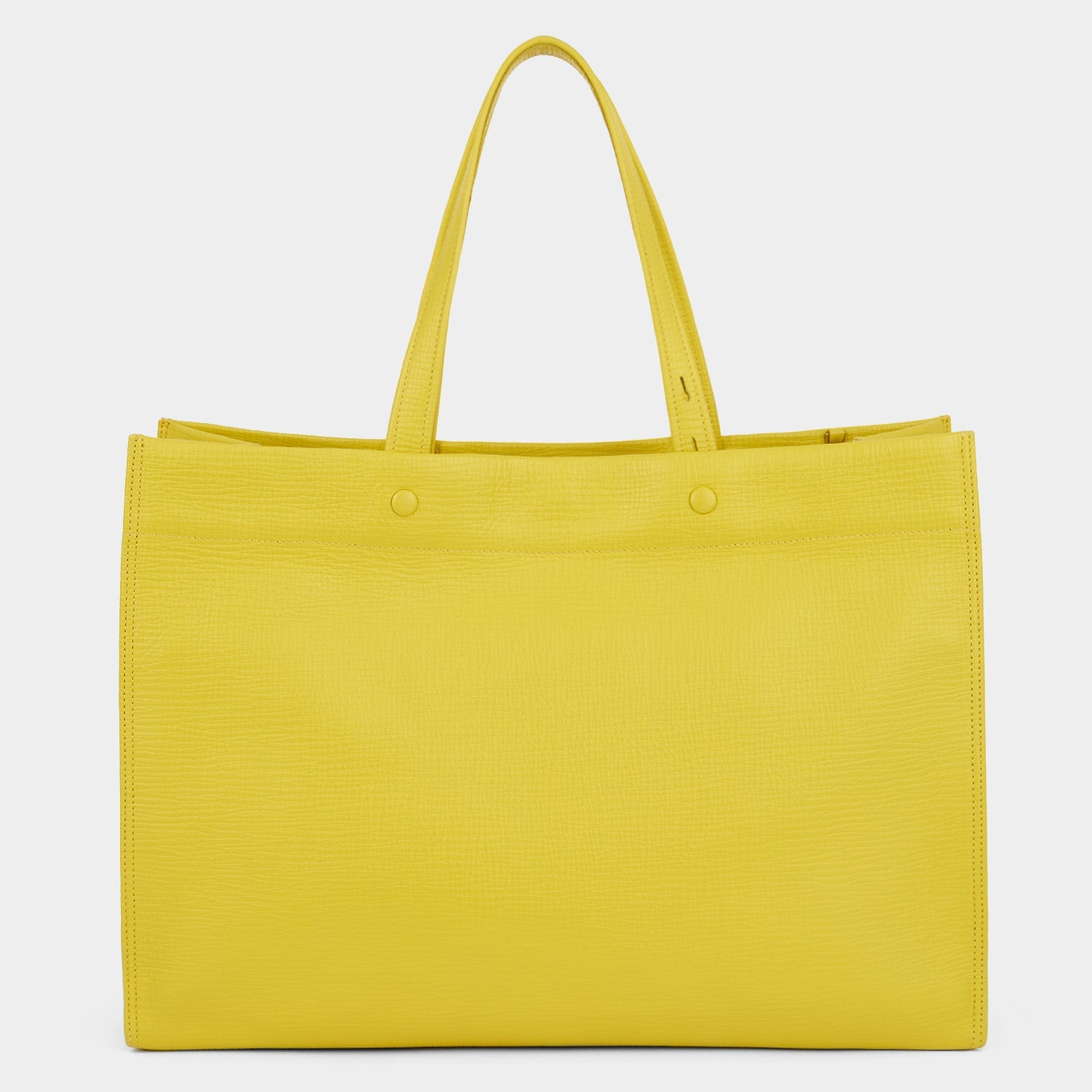 Yellow crosshatch leather tote bag by Anya Hindmarch