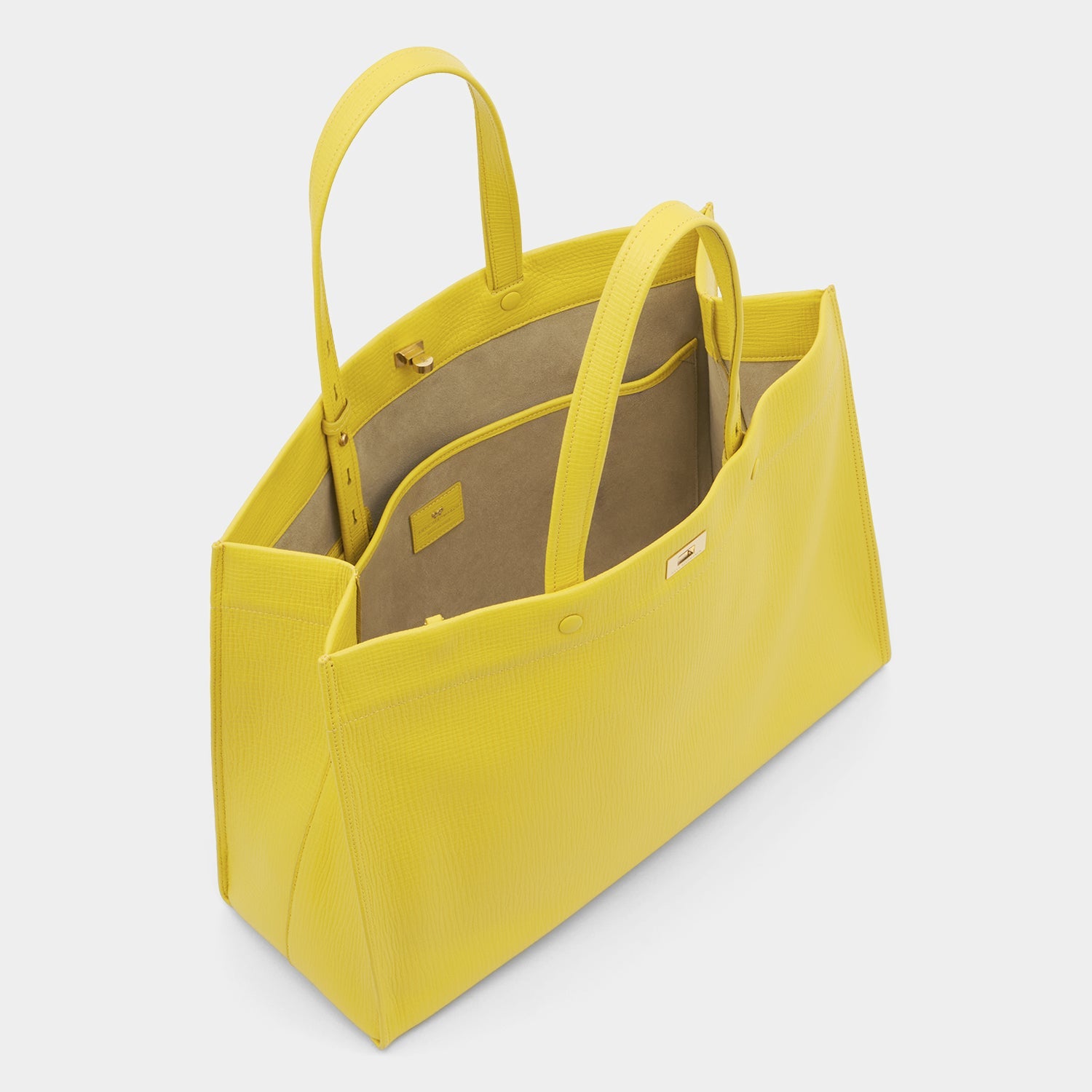 Yellow crosshatch leather tote bag by Anya Hindmarch