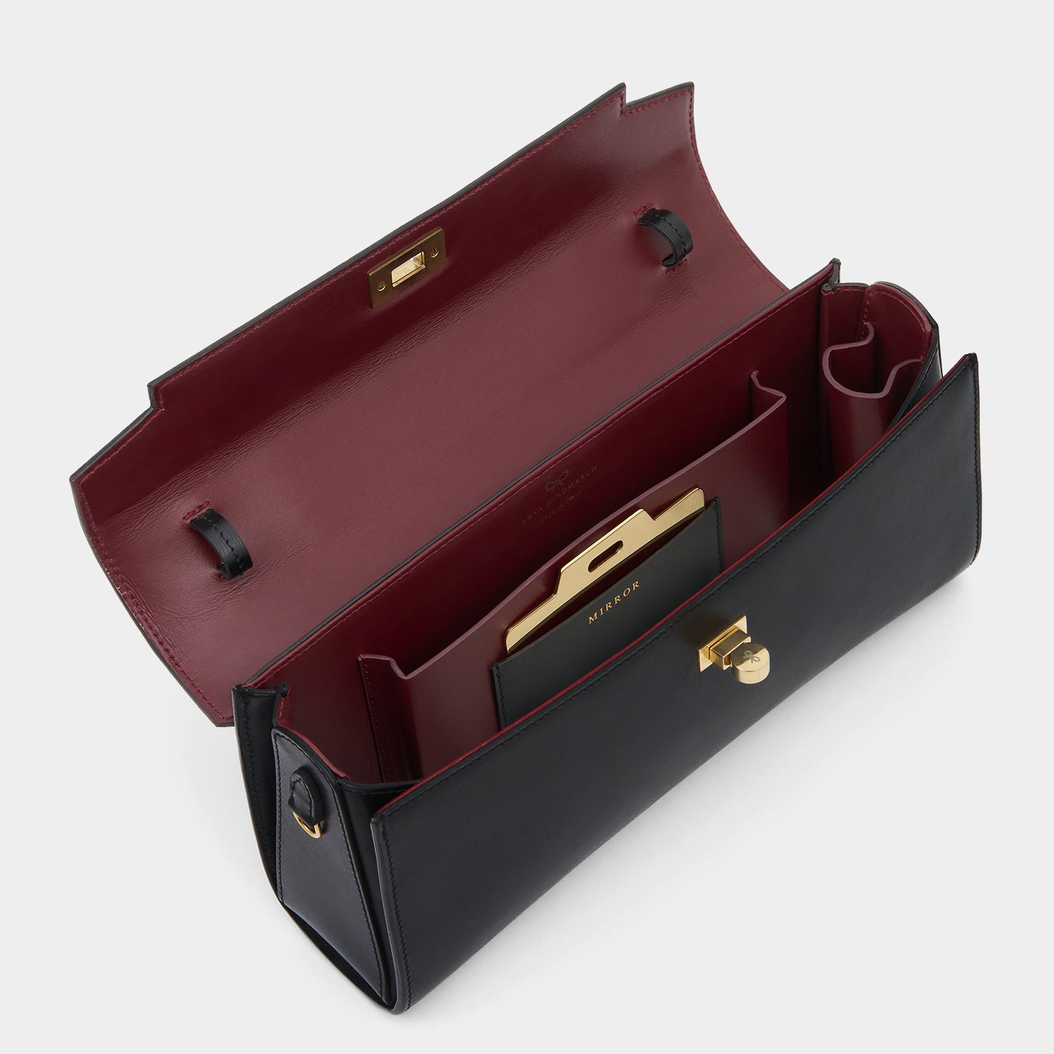 Black calf leather clutch by Anya Hindmarch