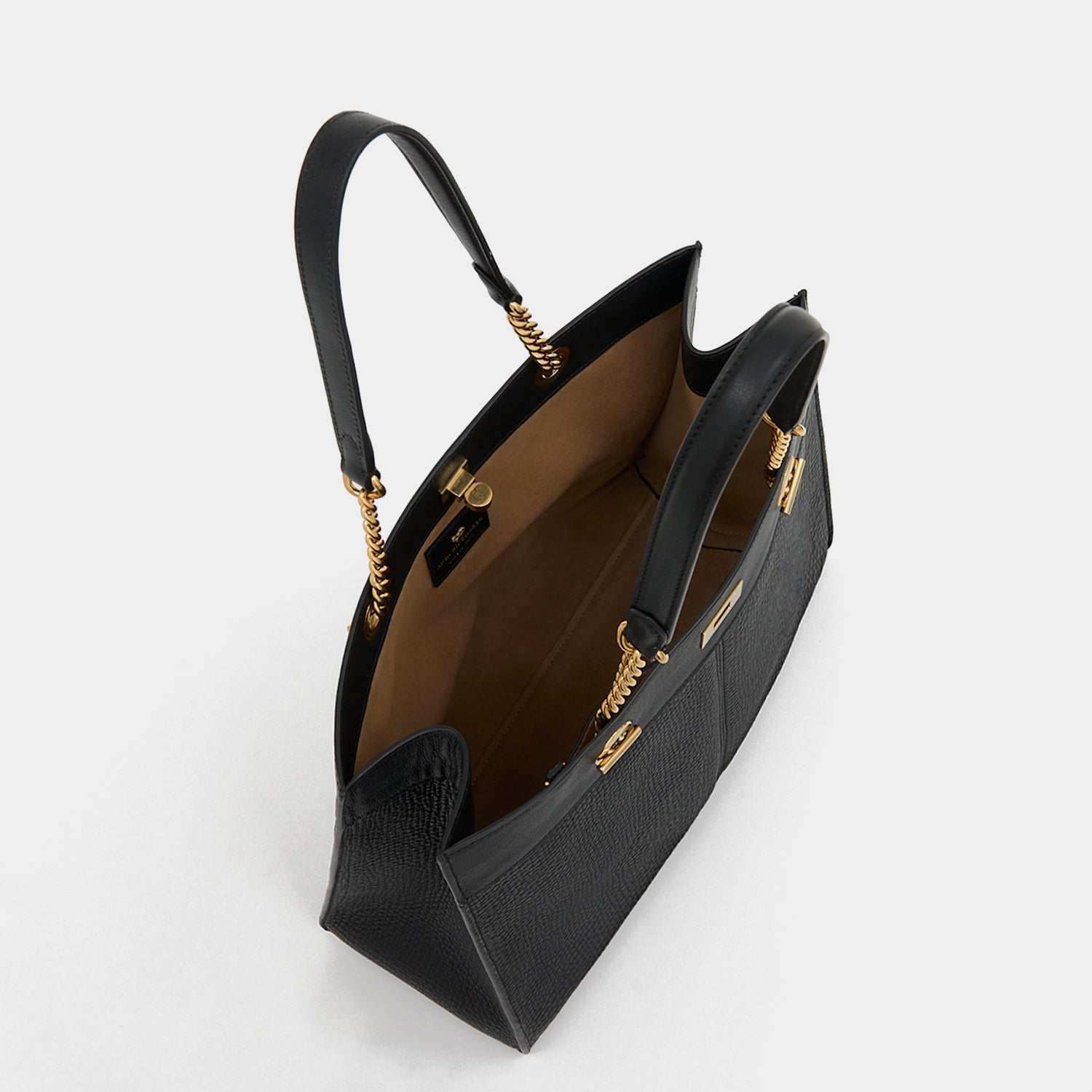 Mortimer Small Eyelet Tote -

          
            Crosshatch Leather in Black -
          

          Anya Hindmarch EU

