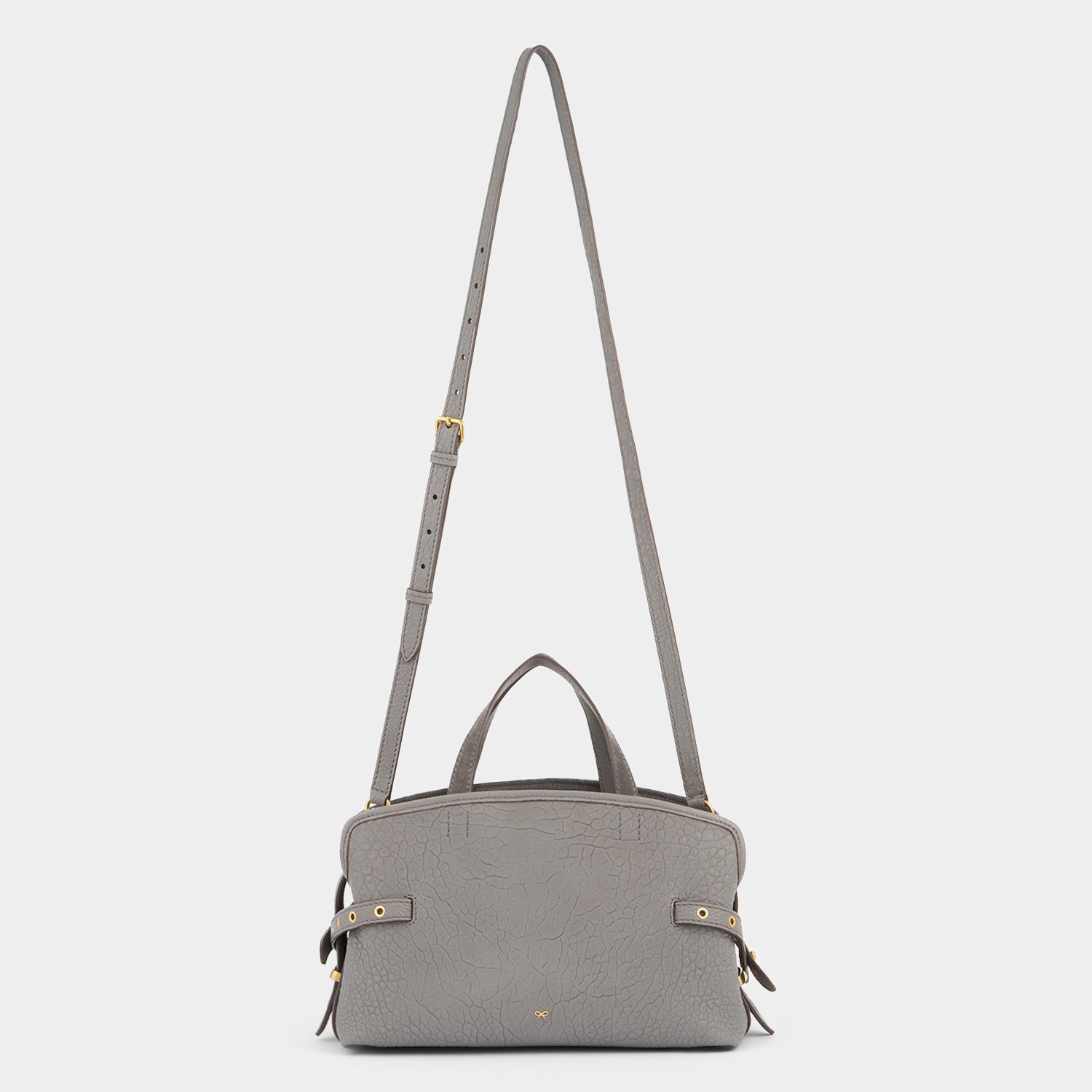 Wilson Eyelet Cross-body -

          
            Suede in Stone Grey -
          

          Anya Hindmarch EU
