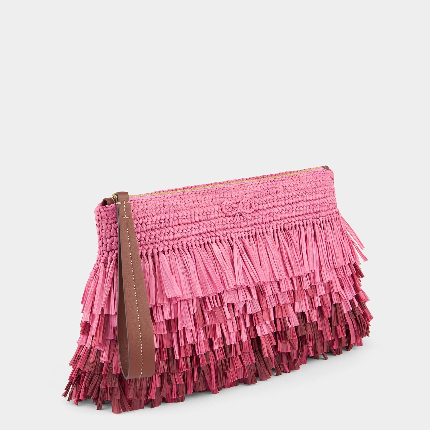 Pink raffia clutch by Anya Hindmarch