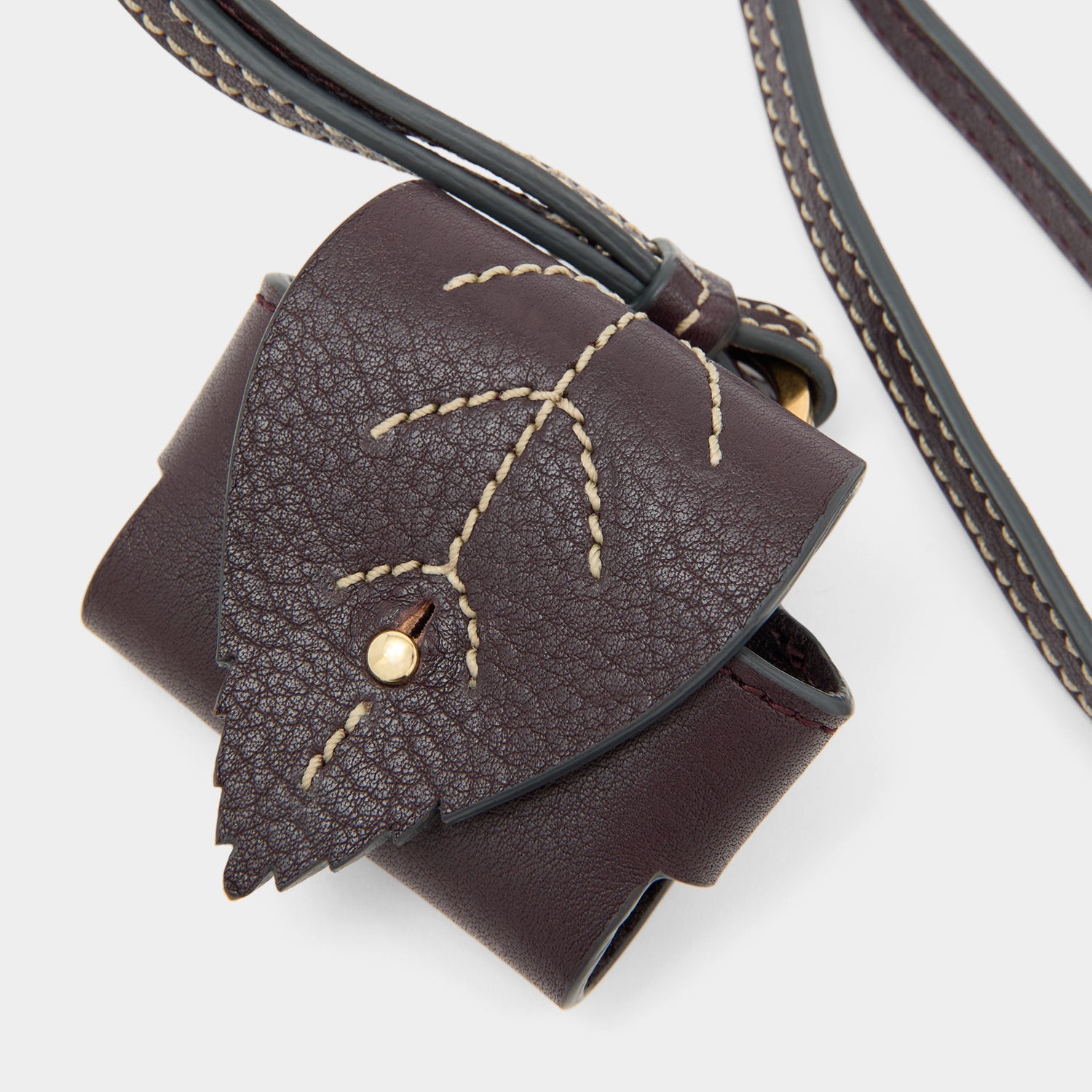 RTN Earphone Case -

          
            Natural Grain Leather in Grape -
          

          Anya Hindmarch EU
