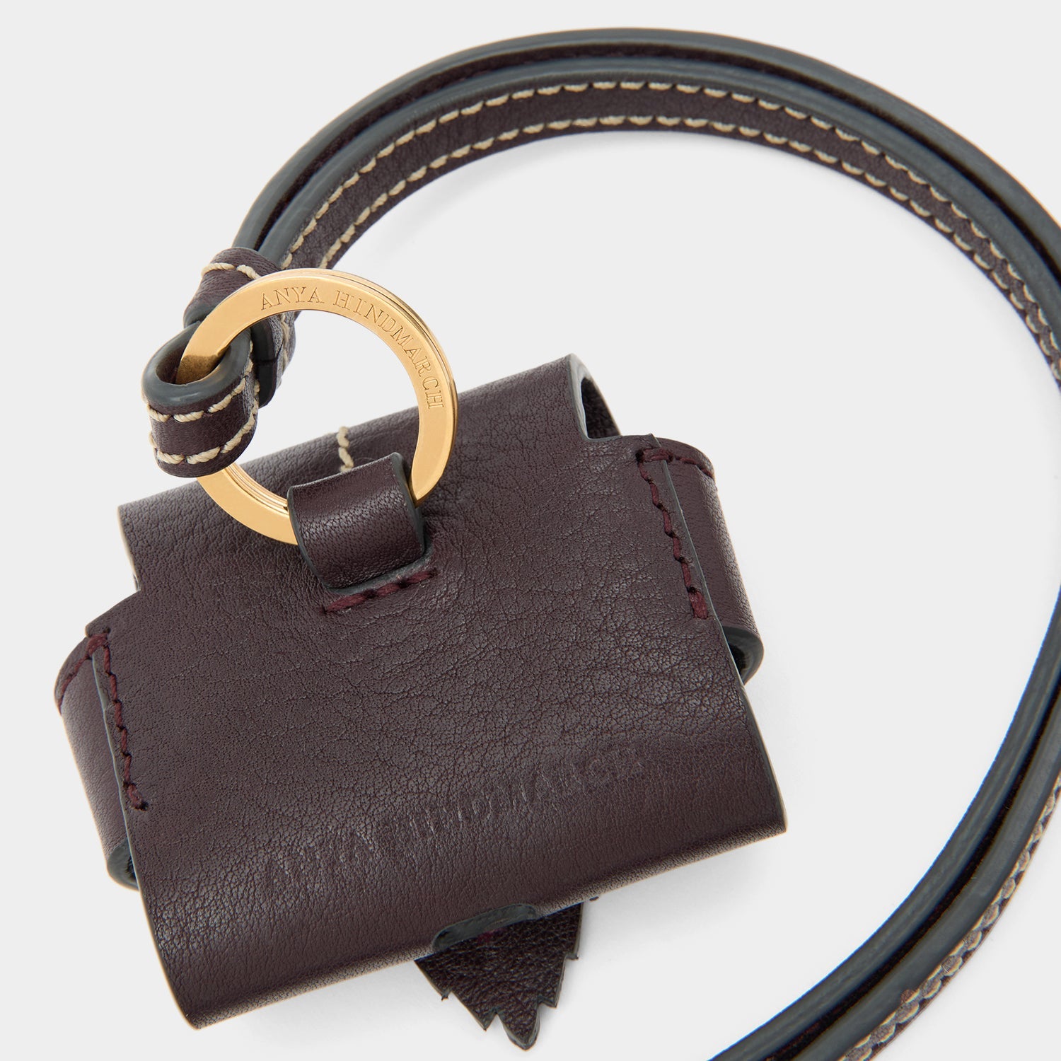 RTN Earphone Case -

          
            Natural Grain Leather in Grape -
          

          Anya Hindmarch EU
