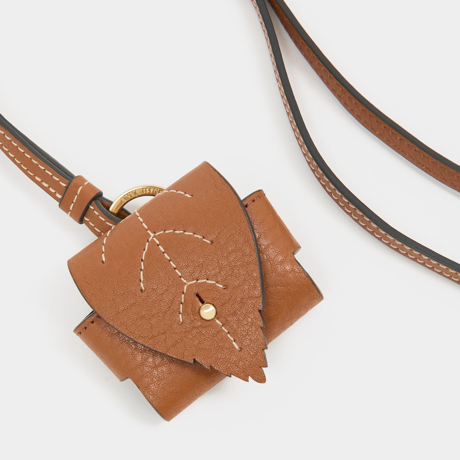 RTN Earphone Case -

          
            Natural Grain Leather in Pecan -
          

          Anya Hindmarch EU
