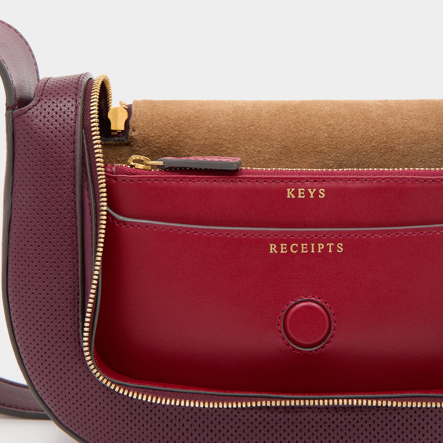 Vere Perforated Small Cross-body -

          
            Perforated Leather in Orchid Purple -
          

          Anya Hindmarch EU
