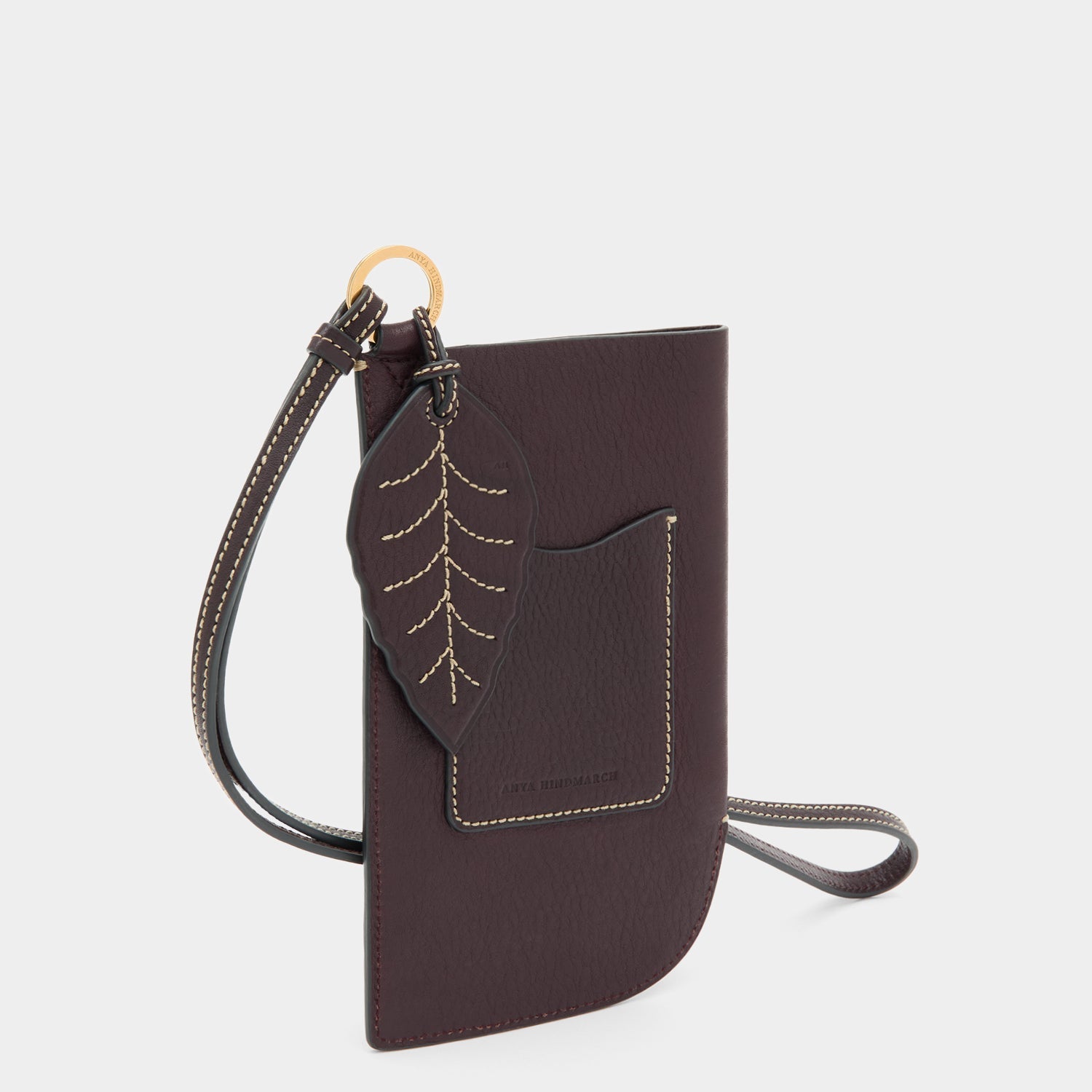 RTN Strap Phone Pouch -

          
            Natural Grain Leather in Grape Purple -
          

          Anya Hindmarch EU

