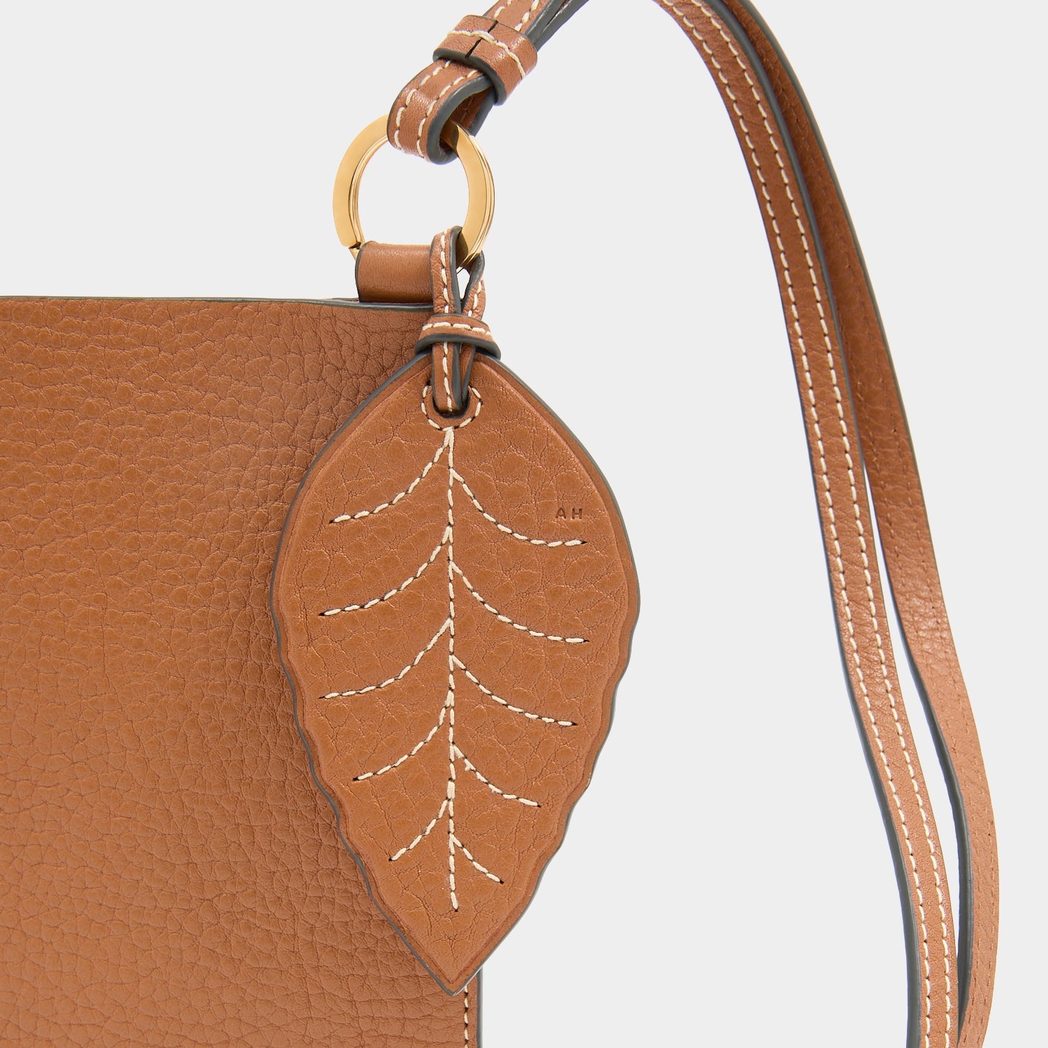 RTN Phone Pouch -

          
            Natural Grain Leather in Pecan -
          

          Anya Hindmarch EU

