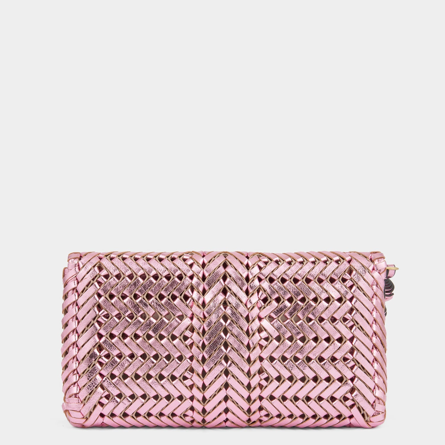 Metallic pink handwoven leather clutch bag by Anya Hindmarch