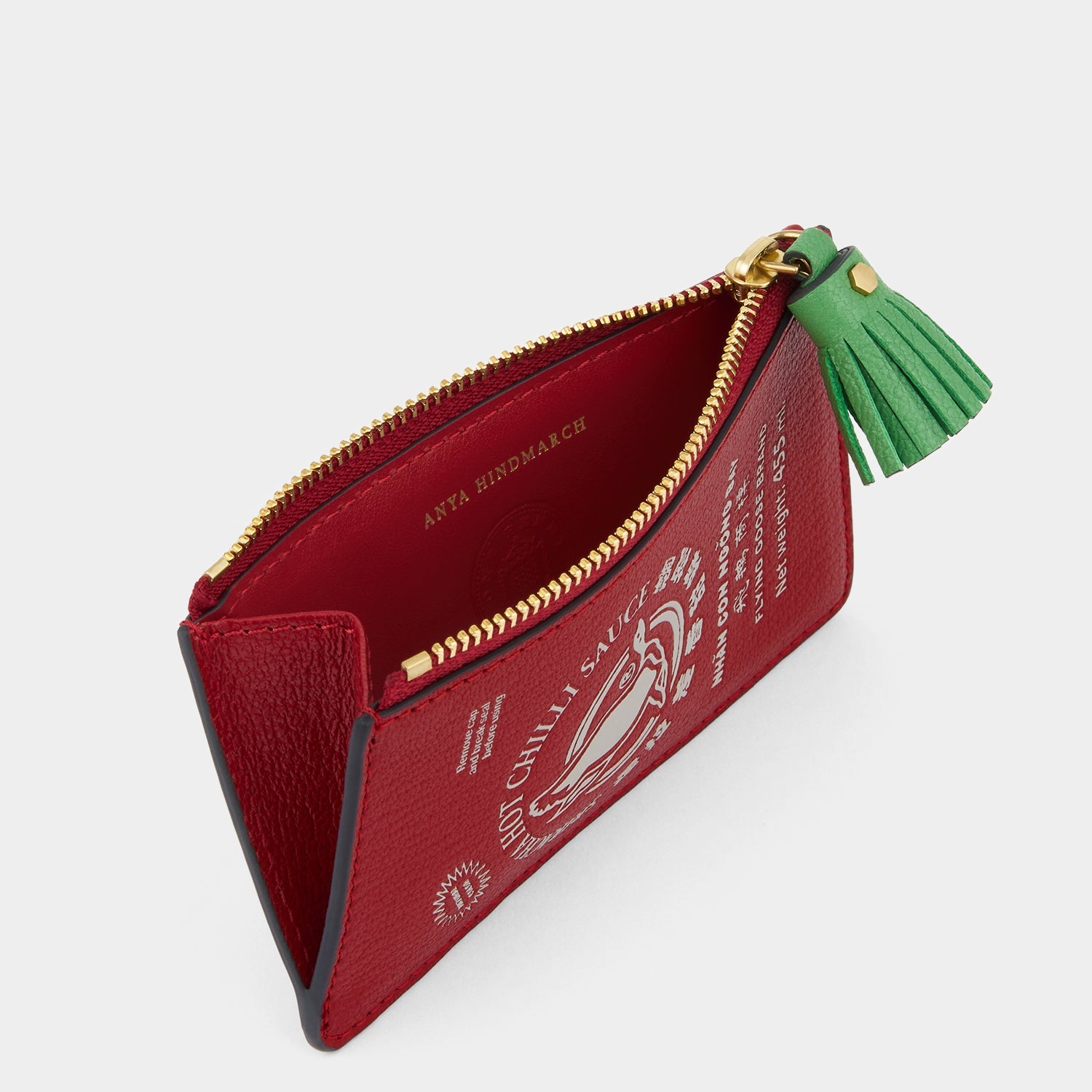 Anya Brands Flying Goose Sriracha Zip Card Case -

          
            Smooth Leather in Russet Red -
          

          Anya Hindmarch EU
