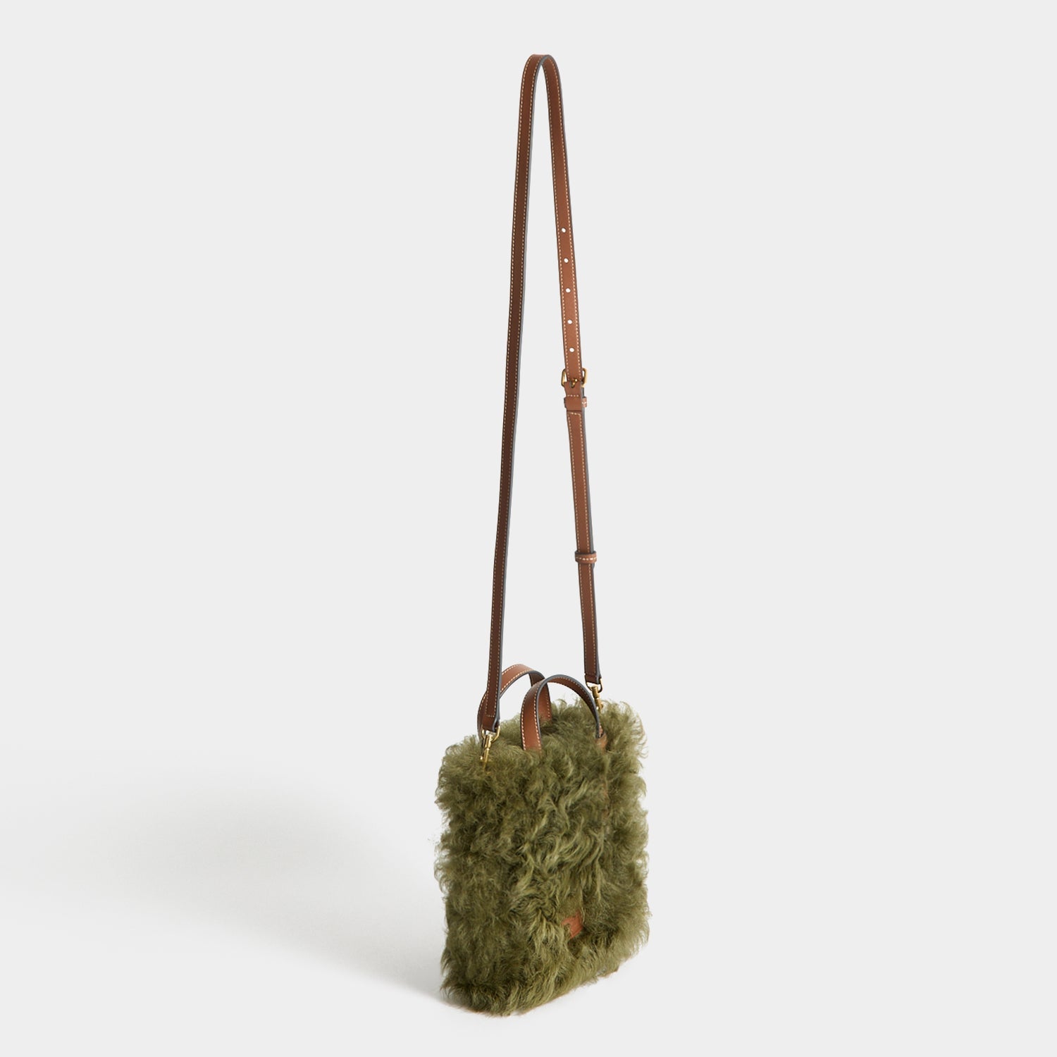N/S Mini Eyes Shearling Tote -

          
            Shearling/Smooth Leather in Khaki Green -
          

          Anya Hindmarch EU

