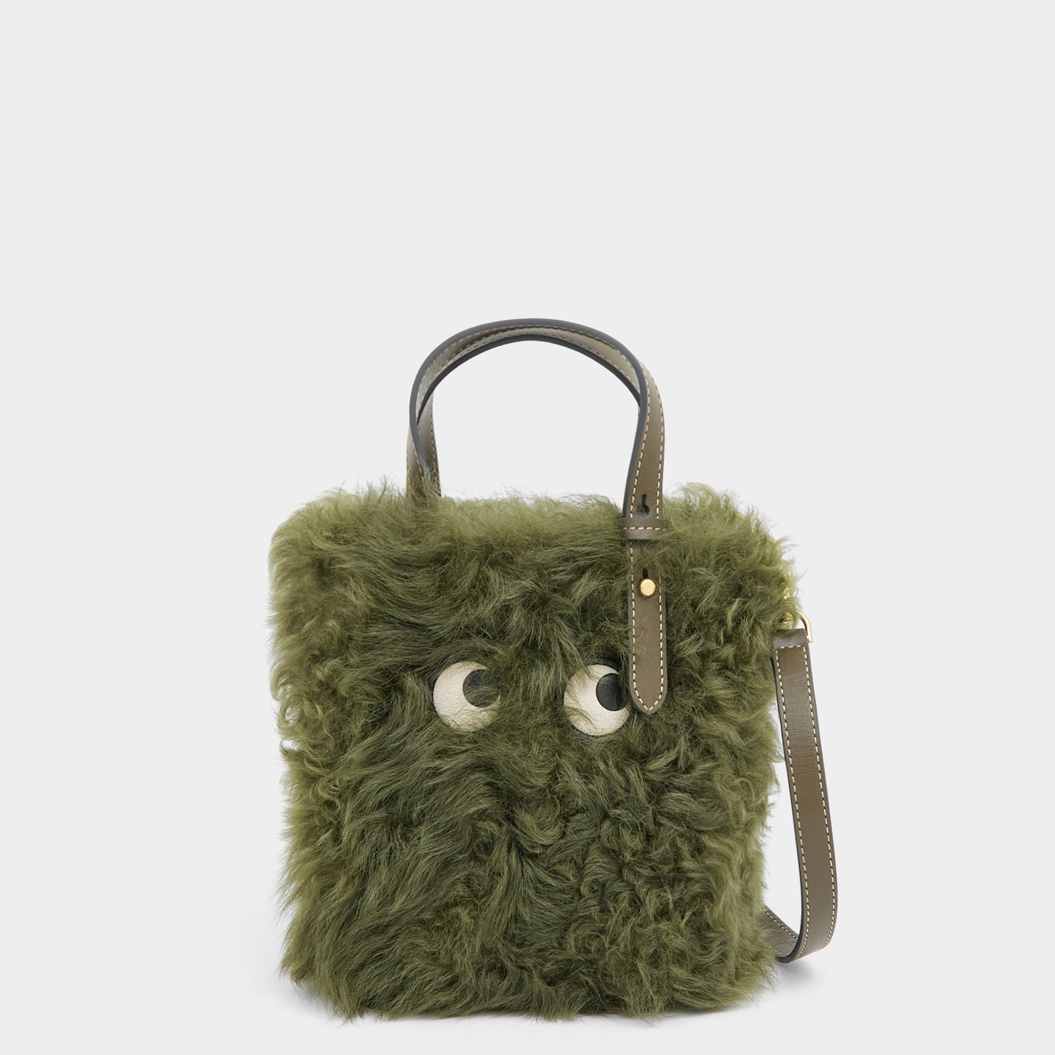 N/S Mini Eyes Shearling Tote -

          
            Shearling/Smooth Leather in Khaki Green -
          

          Anya Hindmarch EU
