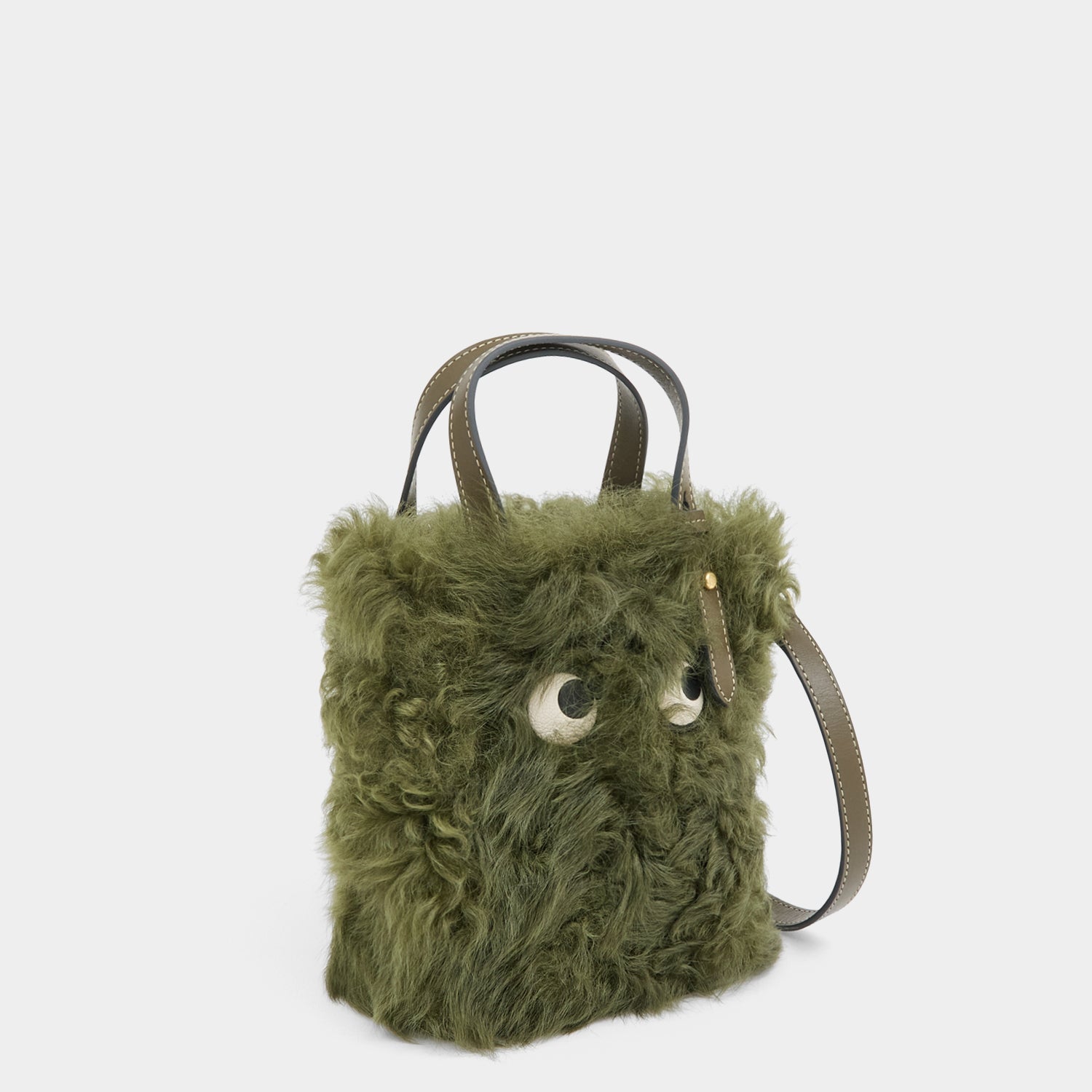 N/S Mini Eyes Shearling Tote -

          
            Shearling/Smooth Leather in Khaki Green -
          

          Anya Hindmarch EU
