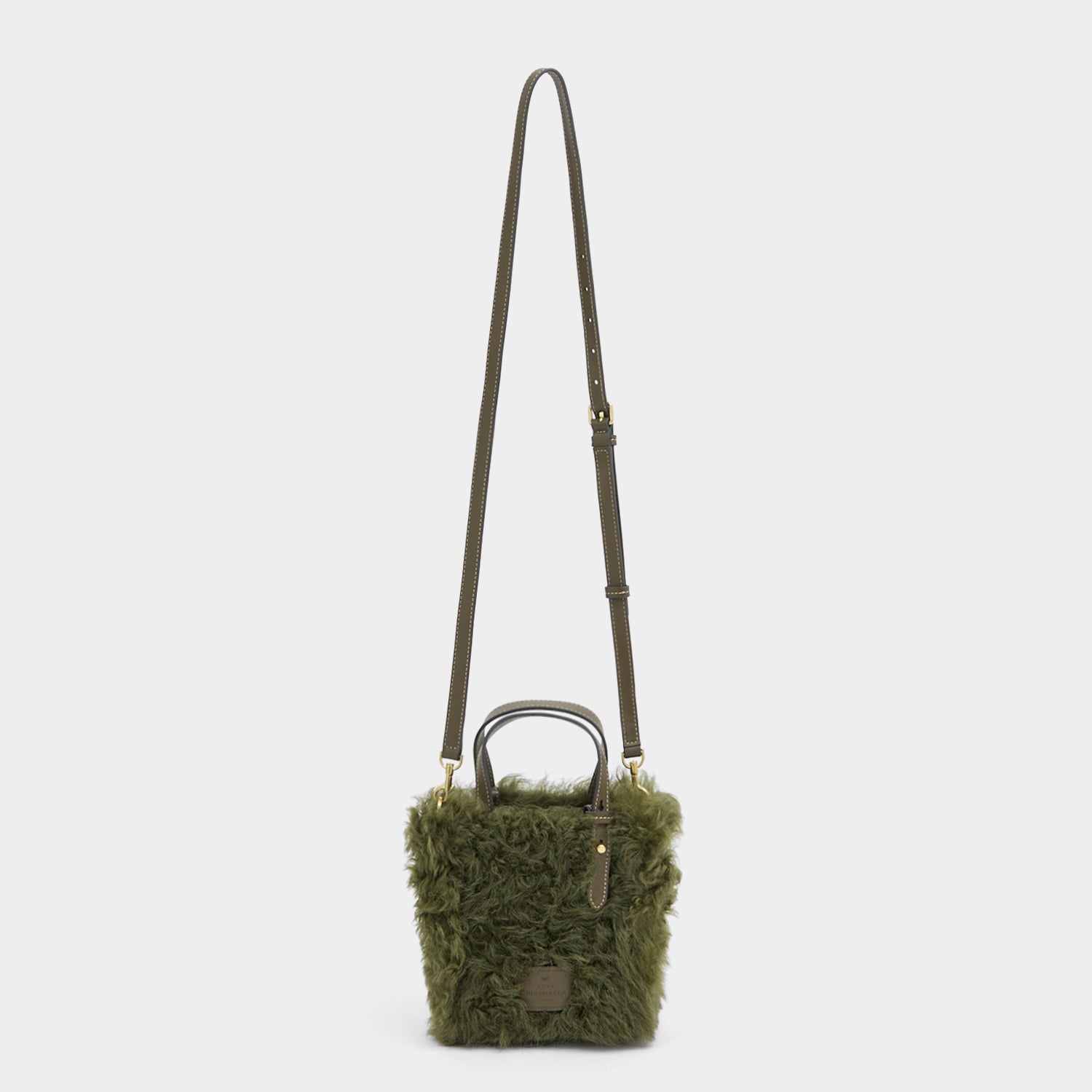 N/S Mini Eyes Shearling Tote -

          
            Shearling/Smooth Leather in Khaki Green -
          

          Anya Hindmarch EU
