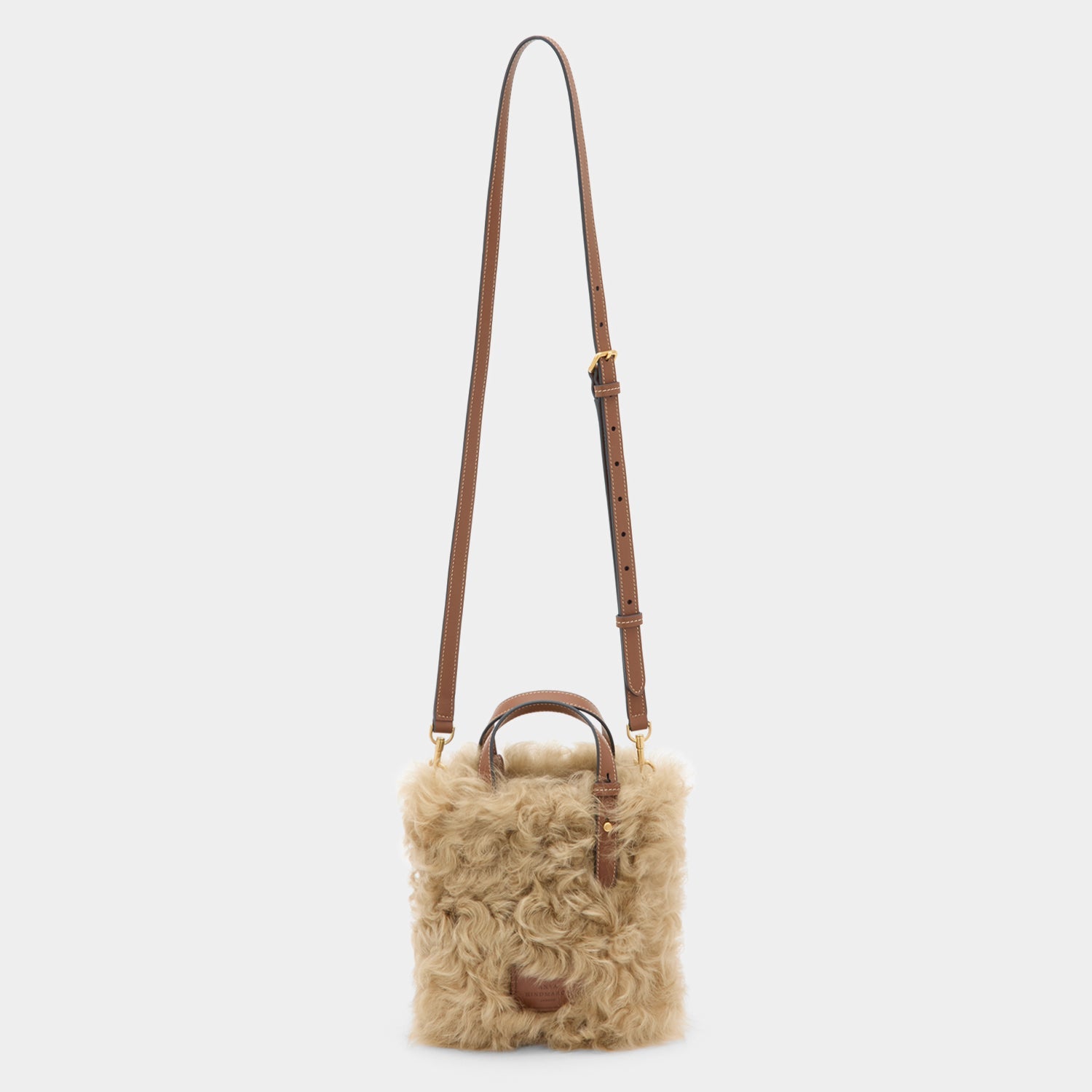 N/S Mini Eyes Shearling Tote -

          
            Shearling/Smooth Leather in Taupe -
          

          Anya Hindmarch EU
