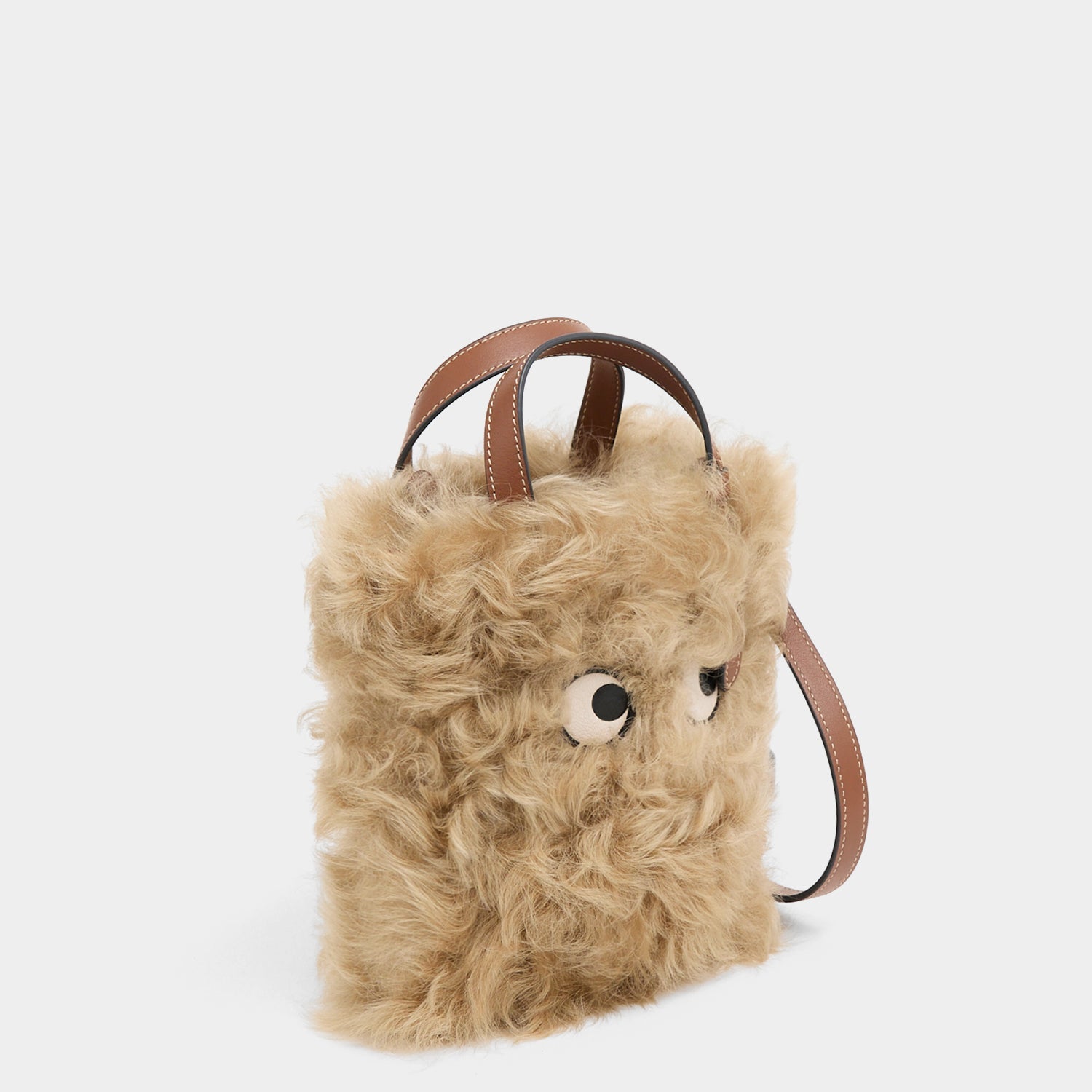 N/S Mini Eyes Shearling Tote -

          
            Shearling/Smooth Leather in Taupe -
          

          Anya Hindmarch EU
