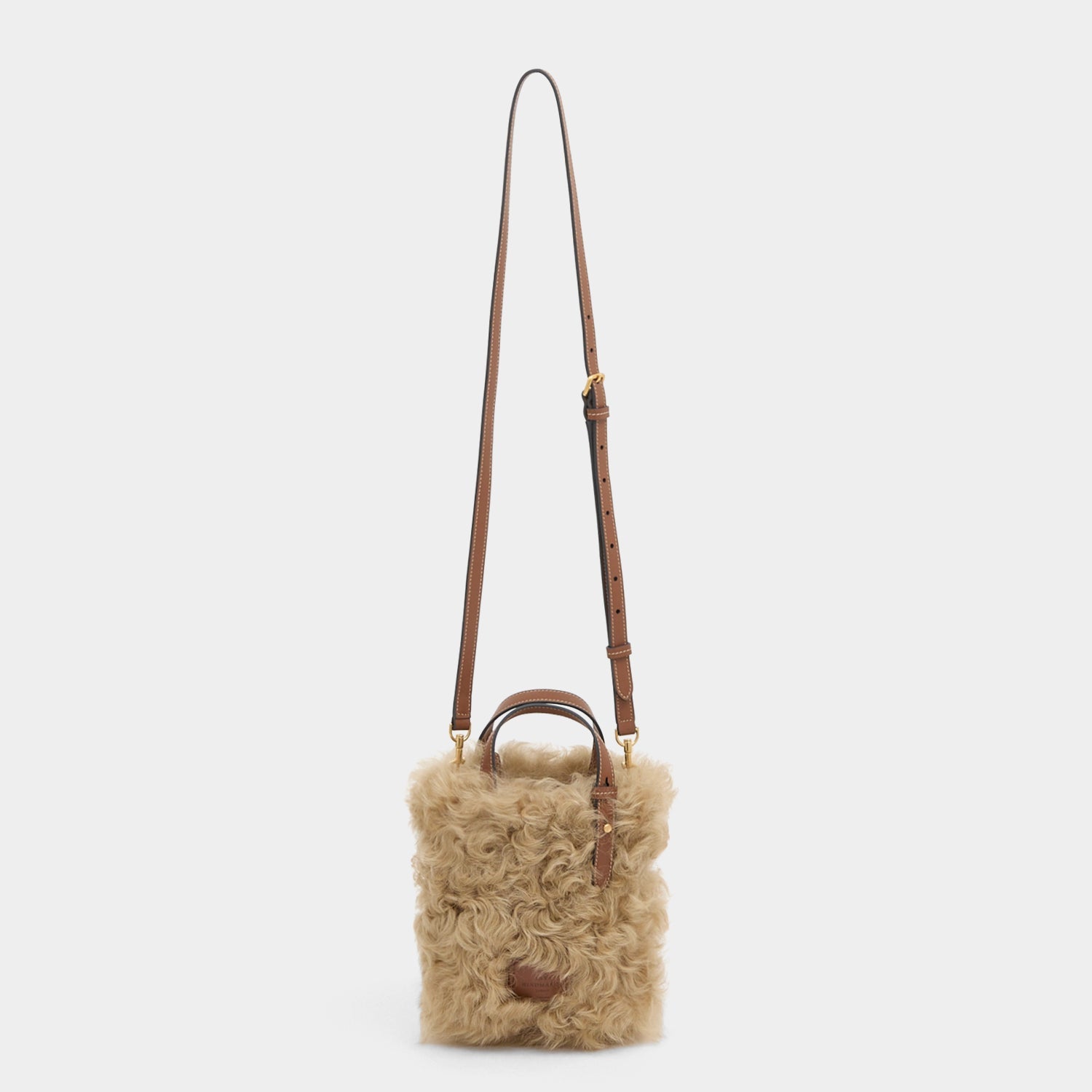 N/S Mini Eyes Shearling Tote -

          
            Shearling/Smooth Leather in Taupe -
          

          Anya Hindmarch EU
