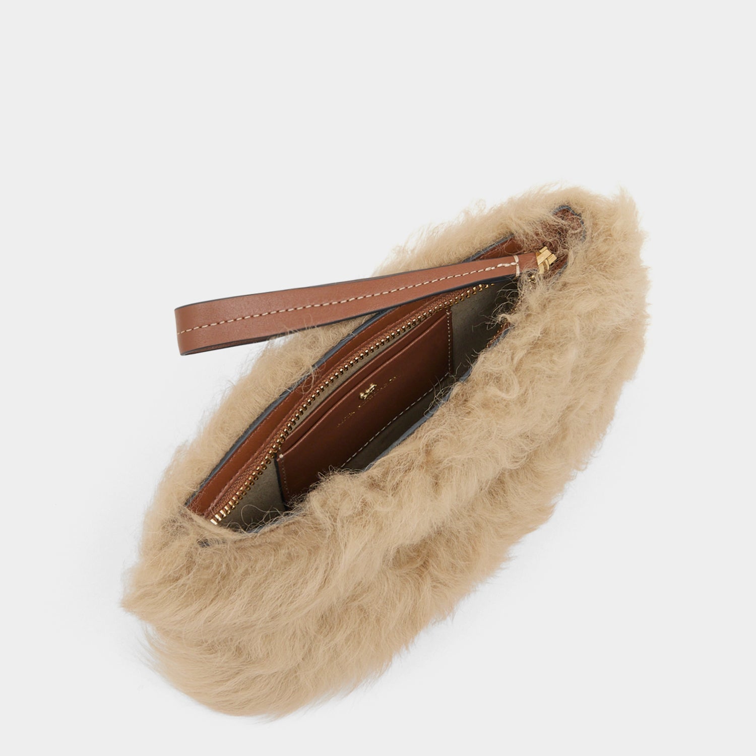 Shearling Eyes Clutch -

          
            Shearling/Smooth Leather leather in Taupe -
          

          Anya Hindmarch EU
