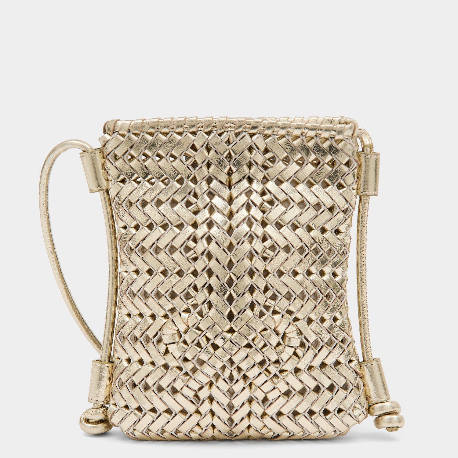 Platinum handwoven leather crossbody pouch by Anya Hindmarch
