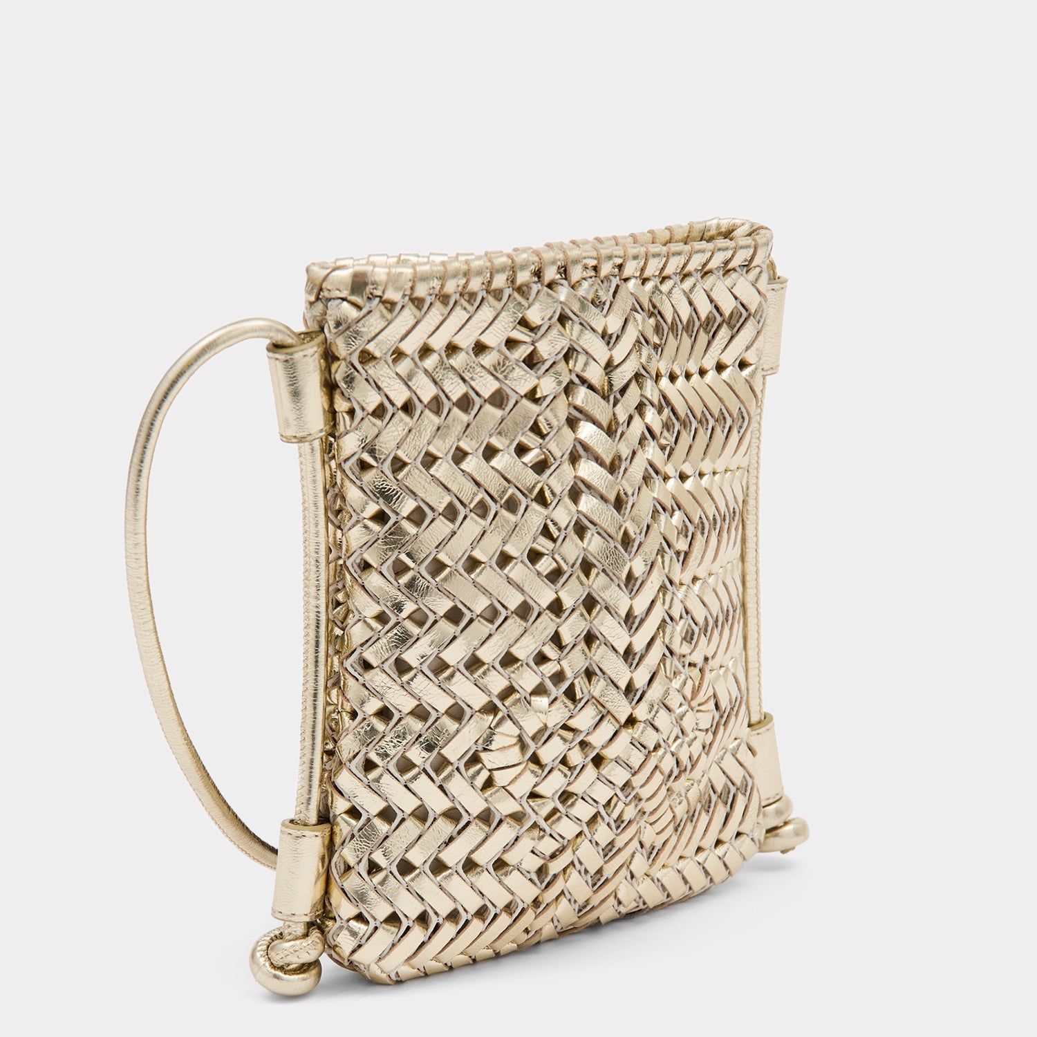Platinum handwoven leather crossbody pouch by Anya Hindmarch