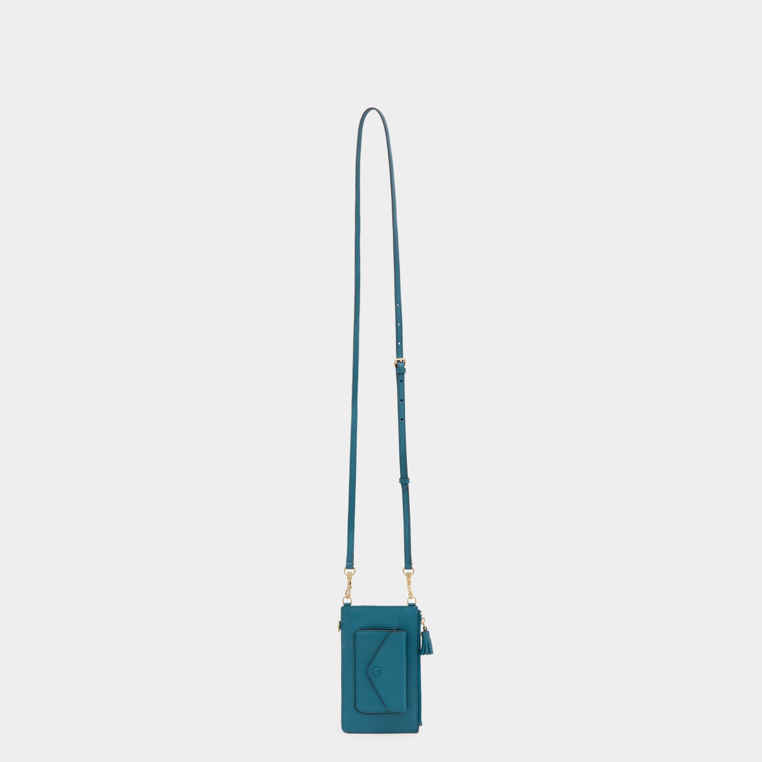 Anya Brands Frosted Flakes Zip Phone Pouch -

          
            Shiny Capra Leather in Light Petrol -
          

          Anya Hindmarch EU
