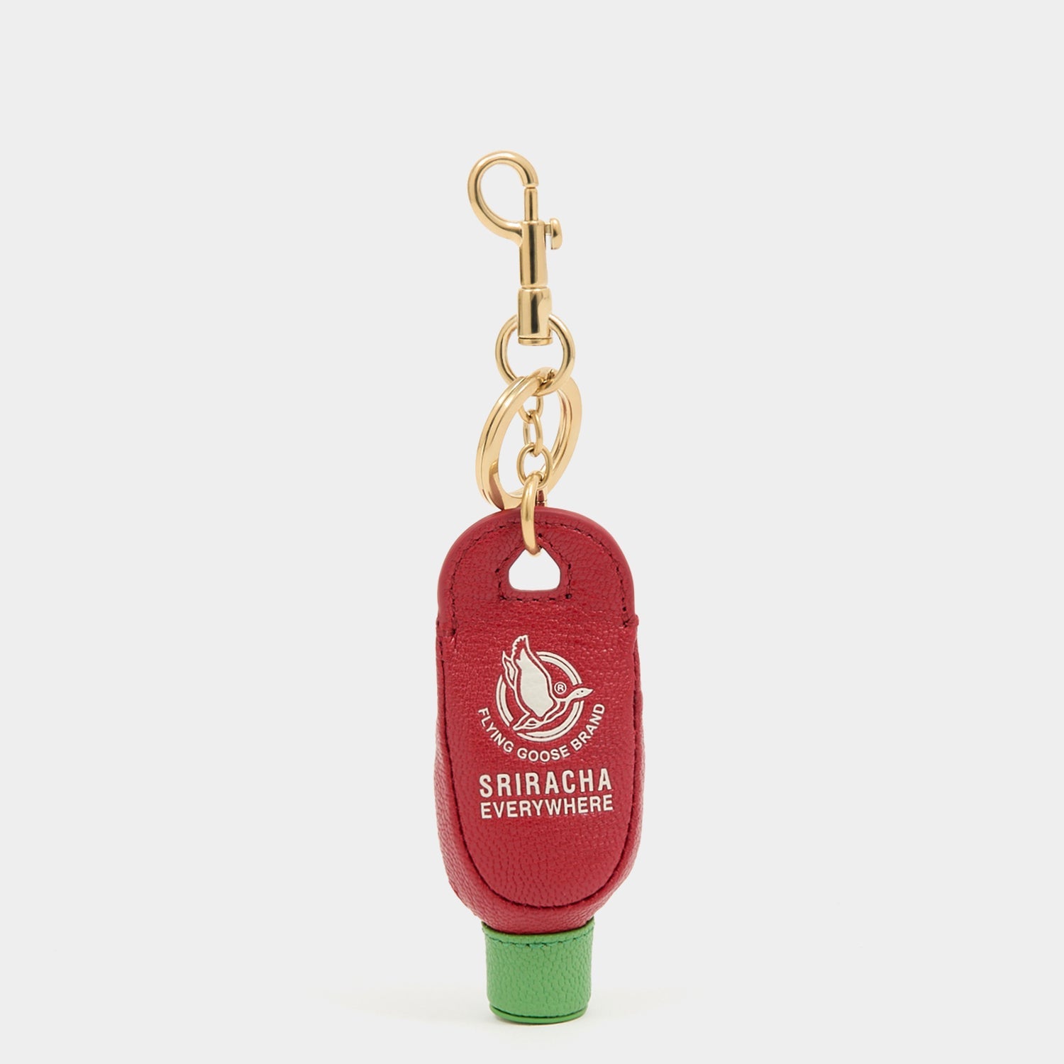 Anya Brands Flying Goose Sriracha Charm -

          
            Smooth Leather in Russet Red -
          

          Anya Hindmarch EU
