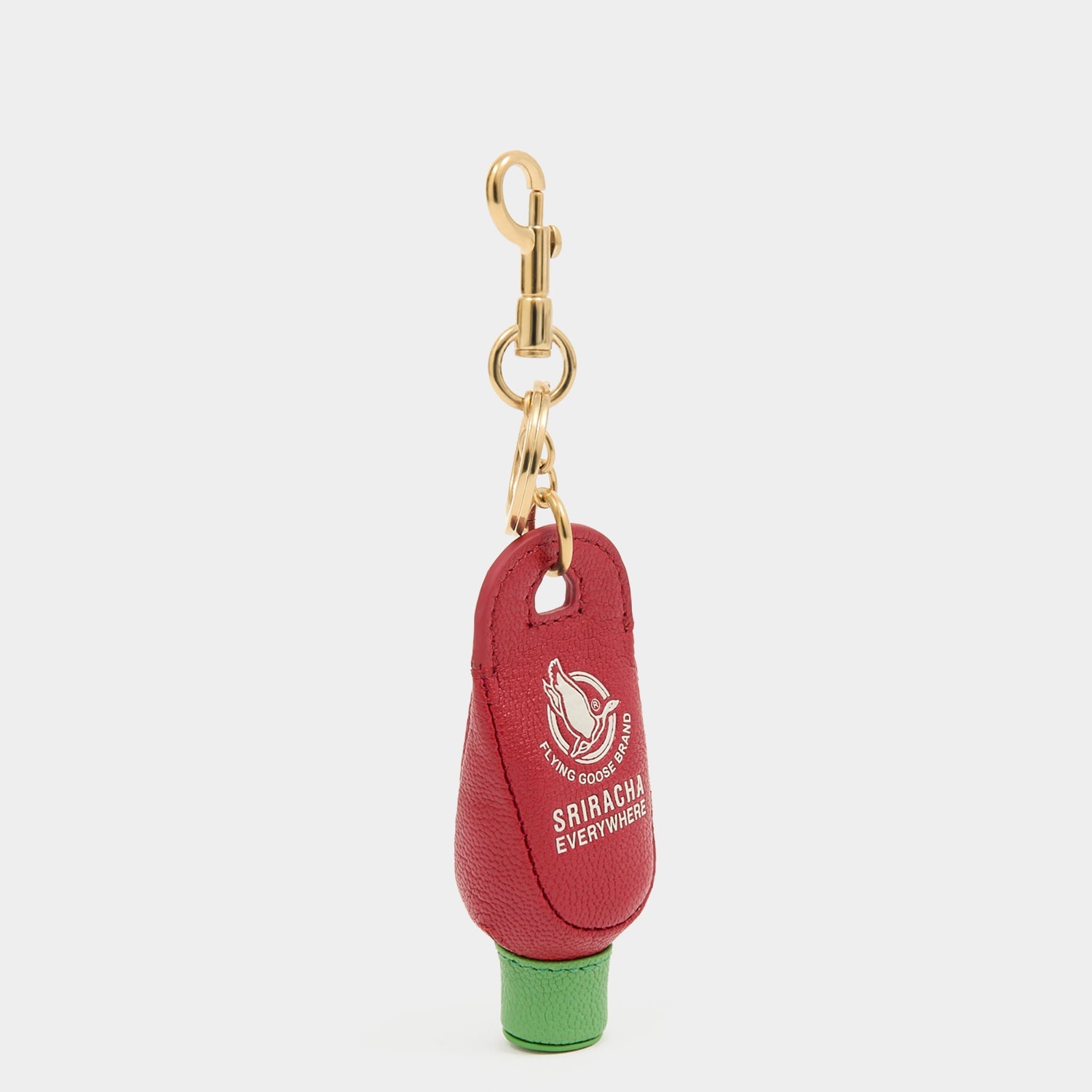 Anya Brands Flying Goose Sriracha Charm -

          
            Smooth Leather in Russet Red -
          

          Anya Hindmarch EU
