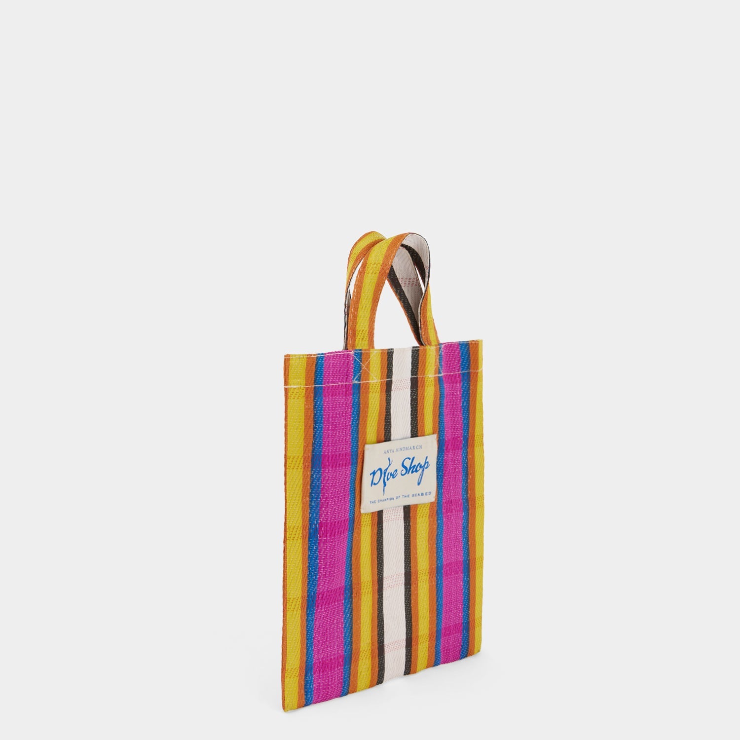 Multicoloured stripy tote bag made of recycled plastic by Anya Hindmarch