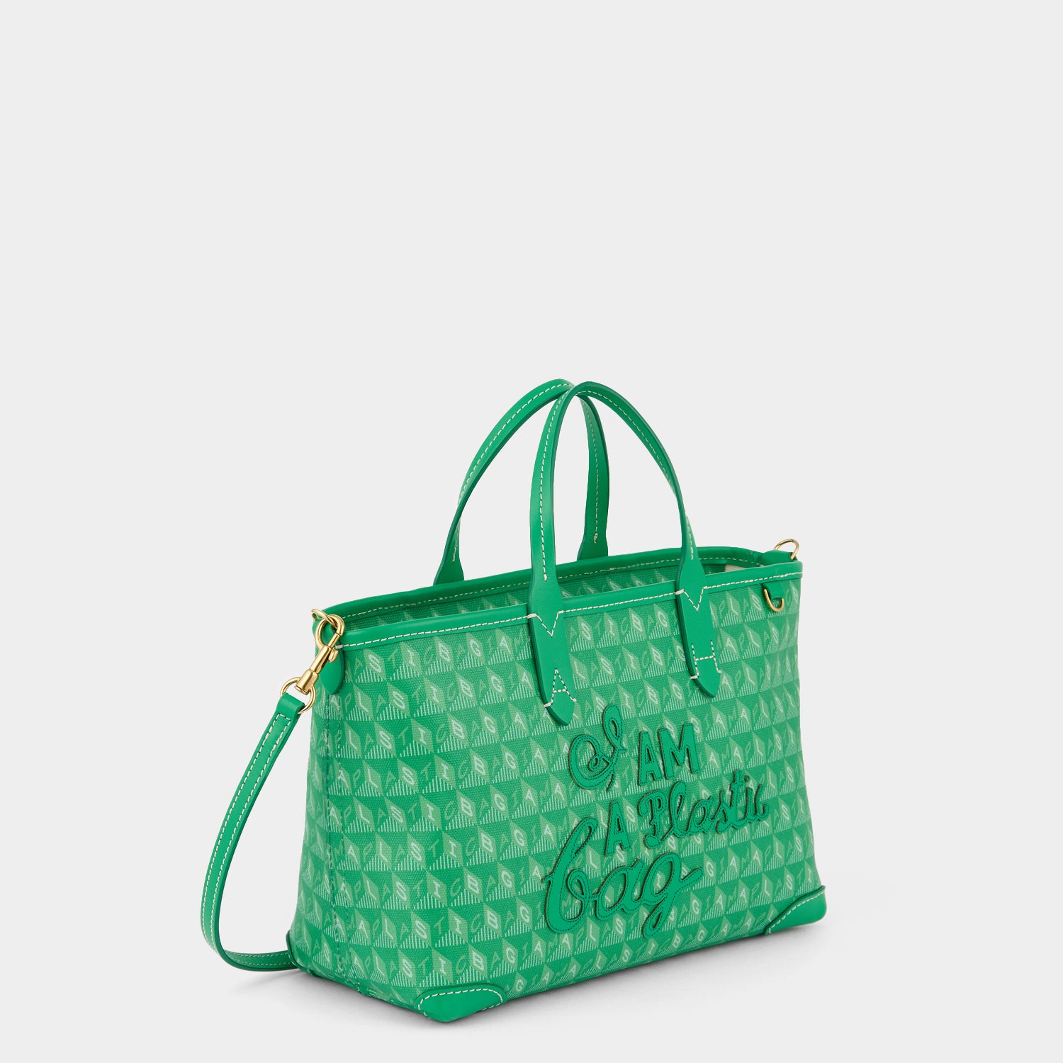 Green small tote bag with adjustable strap made of recycled plastic by anya hindmarch