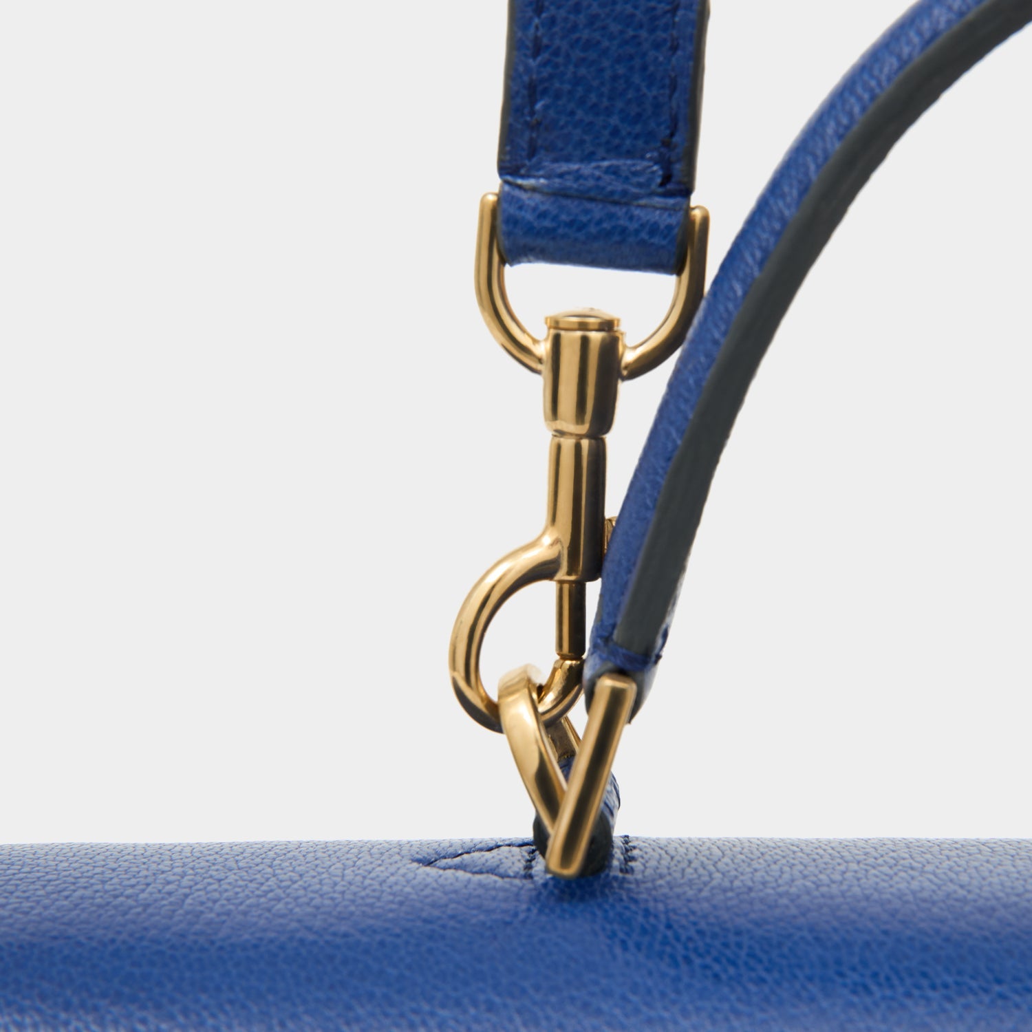 Peanuts Snoopy Mortimer Top Handle -

          
            Capra Leather in Monday Blue -
          

          Anya Hindmarch EU
