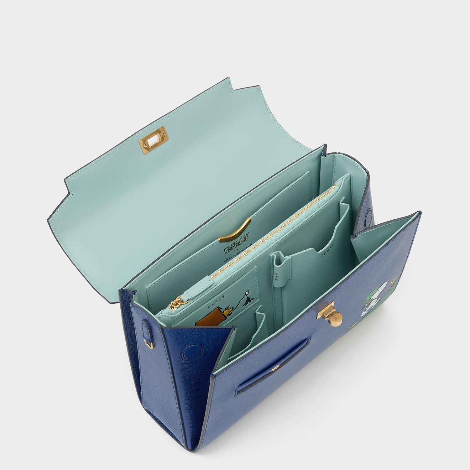 Peanuts Snoopy Mortimer Top Handle -

          
            Capra Leather in Monday Blue -
          

          Anya Hindmarch EU
