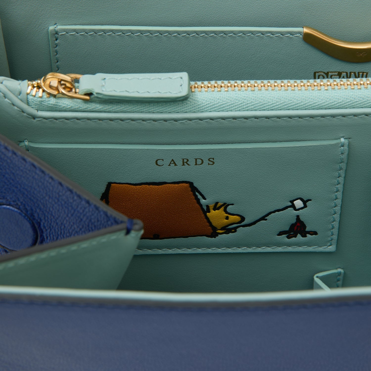 Peanuts Snoopy Mortimer Top Handle -

          
            Capra Leather in Monday Blue -
          

          Anya Hindmarch EU
