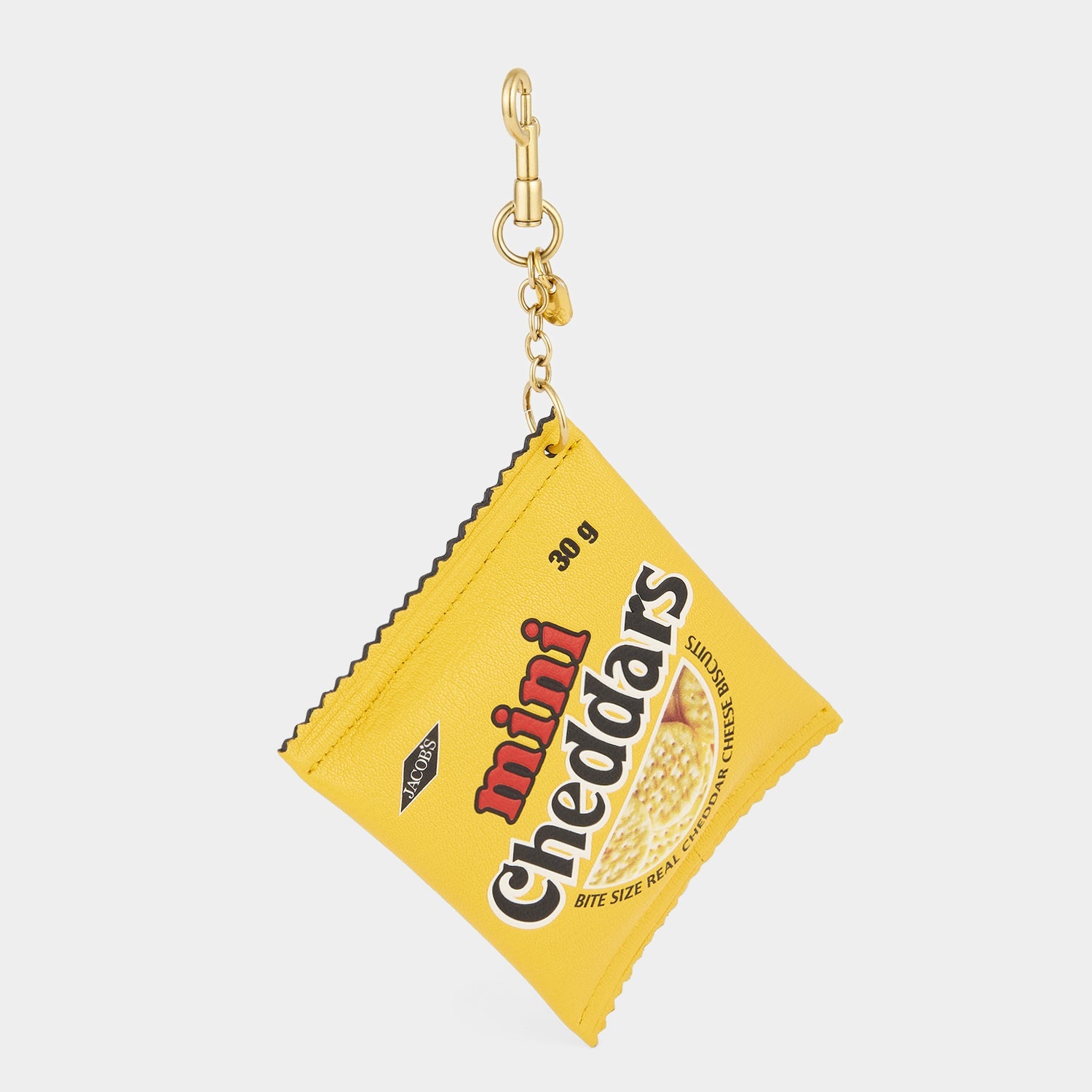 Anya Brands Jacob's Mini Cheddars Earphone Case Charm -

          
            Calf Leather in Lemon Curd Yellow -
          

          Anya Hindmarch EU
