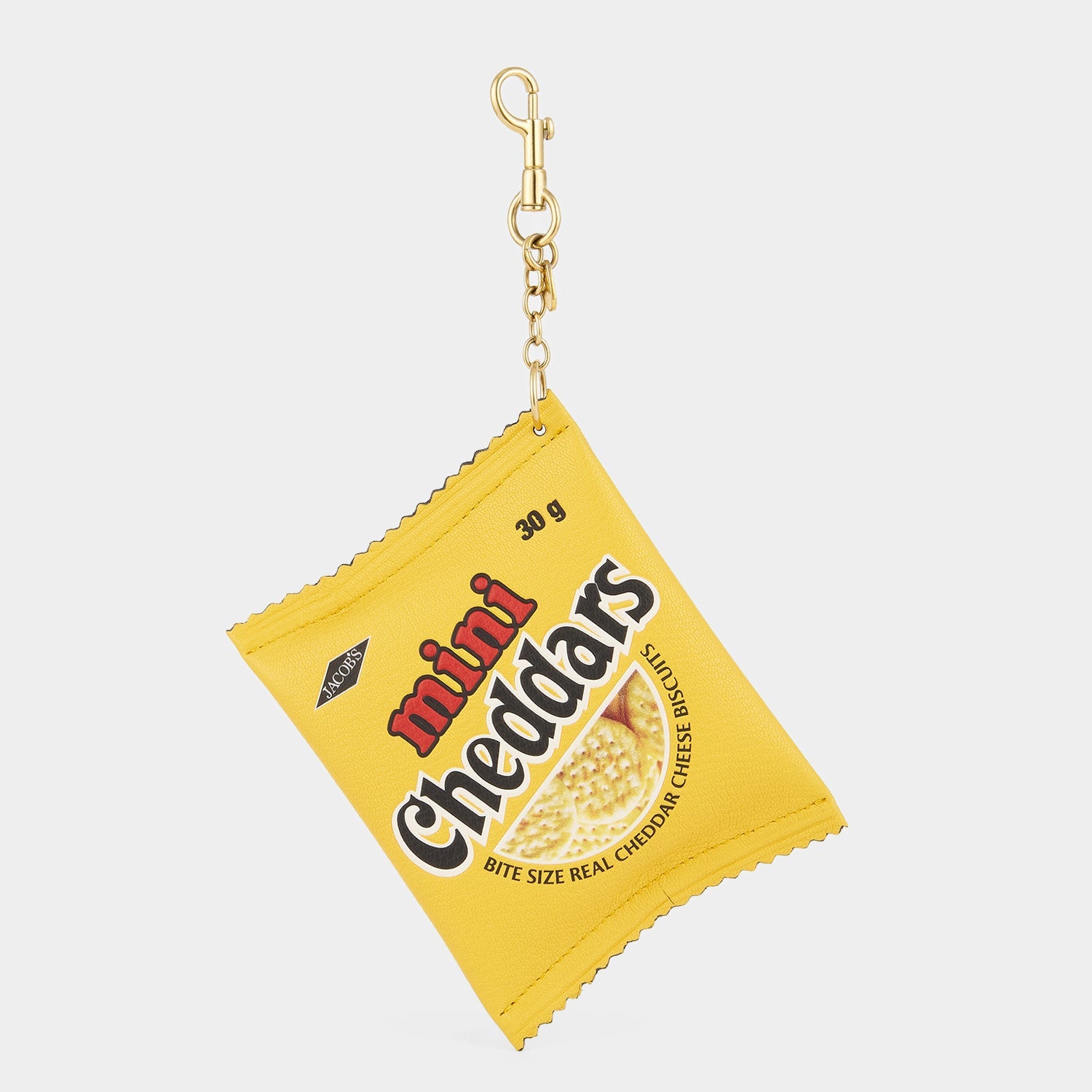 Anya Brands Jacob's Mini Cheddars Earphone Case Charm -

          
            Calf Leather in Lemon Curd Yellow -
          

          Anya Hindmarch EU
