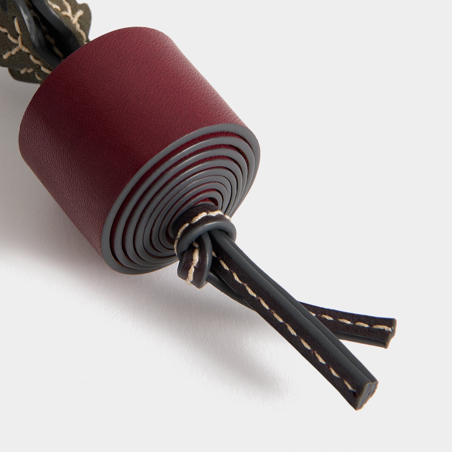 Return to Nature Radish Charm -

          
            Compostable Leather in Resewood red -
          

          Anya Hindmarch EU
