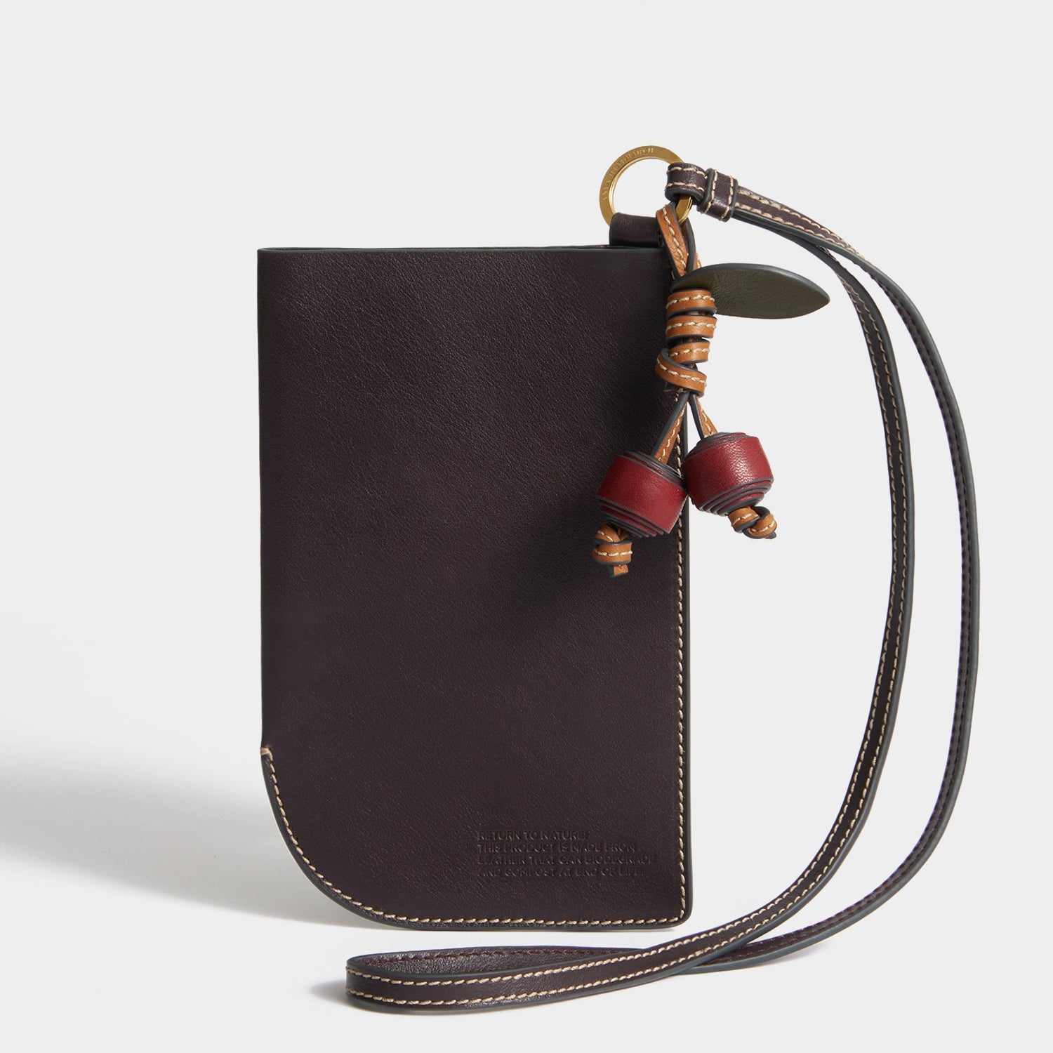 Return To Nature Strap Phone Pouch -

          
            Natural Grain Leather in Grape -
          

          Anya Hindmarch EU
