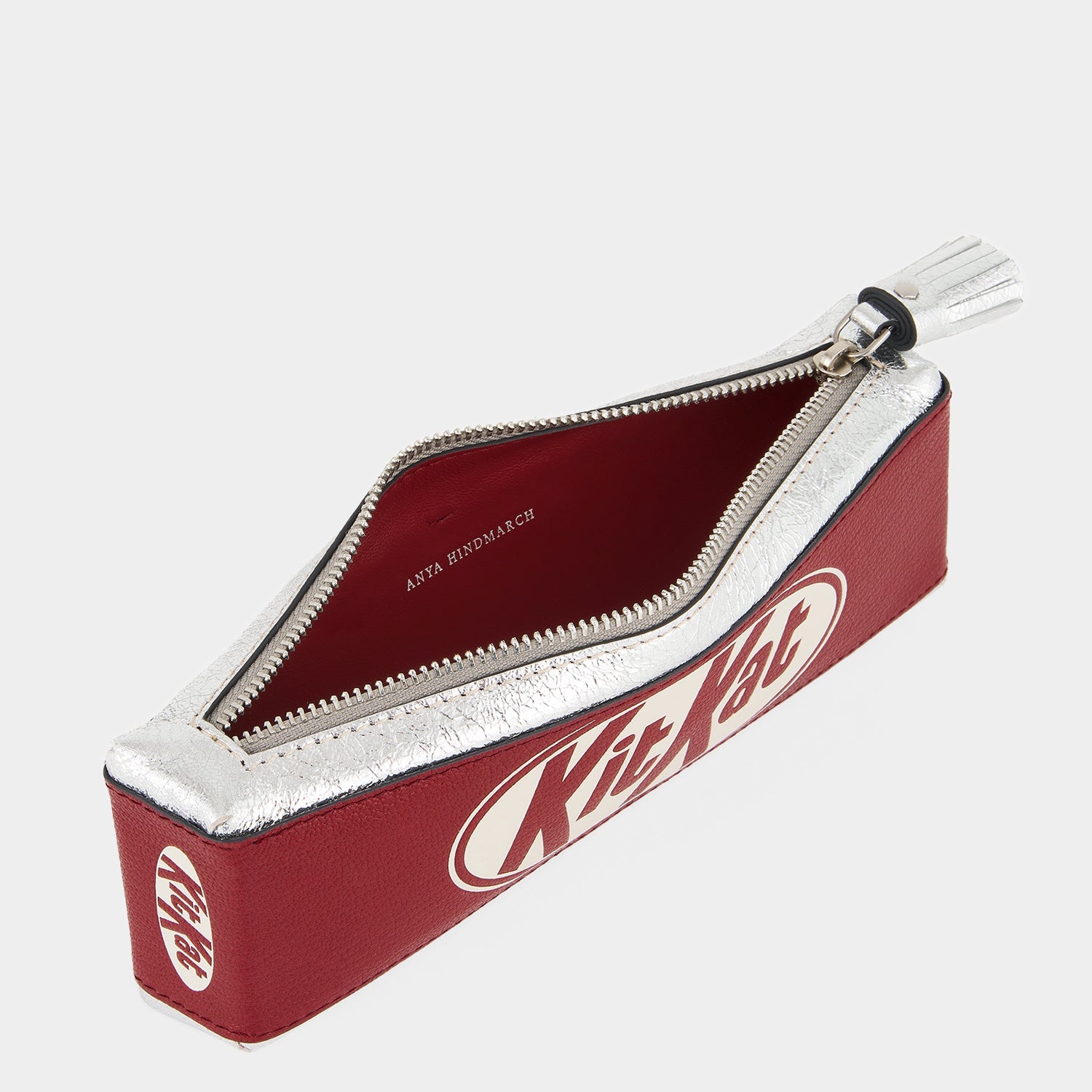 Anya Brands Kit Kat Pencil Case -

          
            Calf Leather in Red and Metallic Silver -
          

          Anya Hindmarch EU
