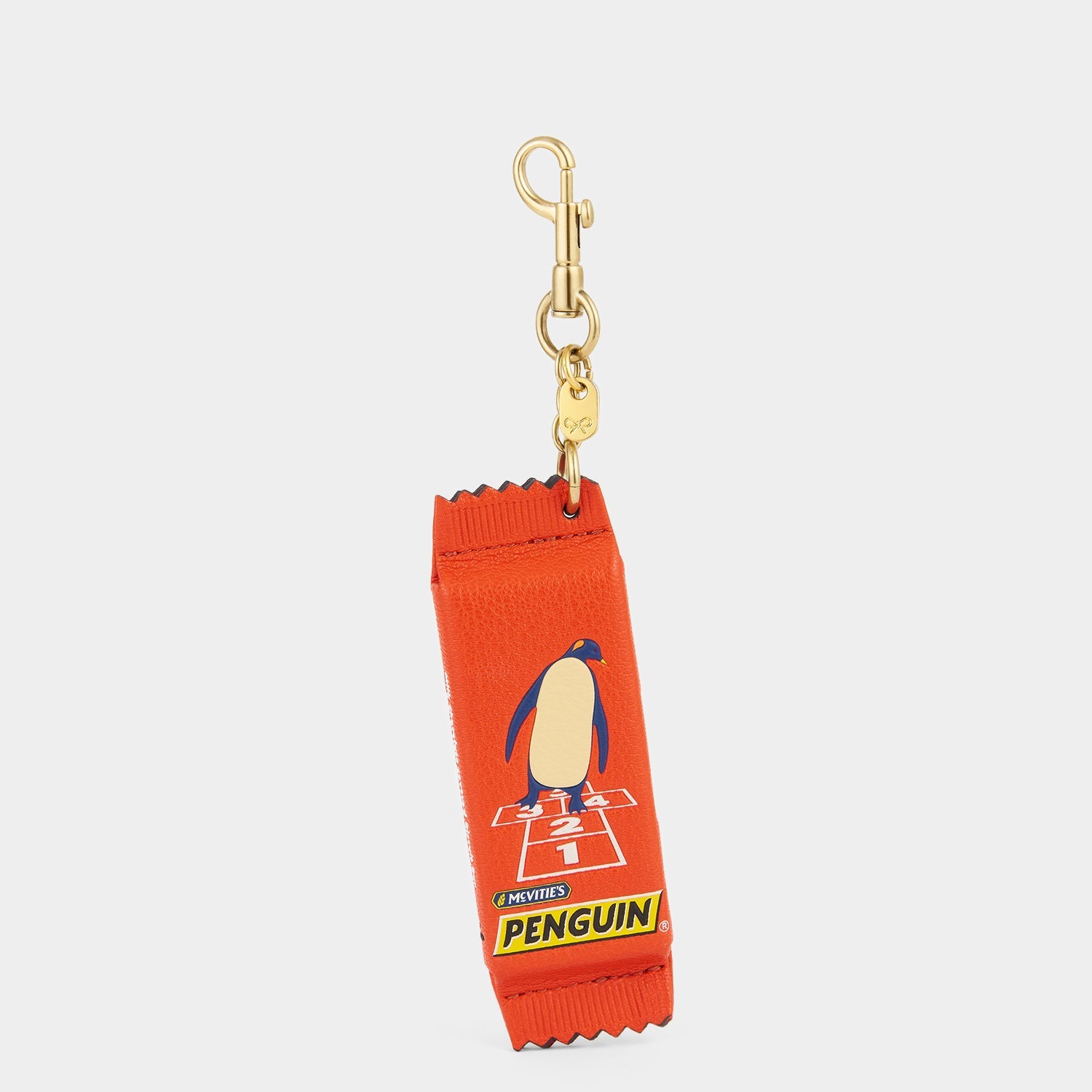 Anya Brands McVitie's Penguin Charm -

          
            Calf Leather in Flag Red -
          

          Anya Hindmarch EU
