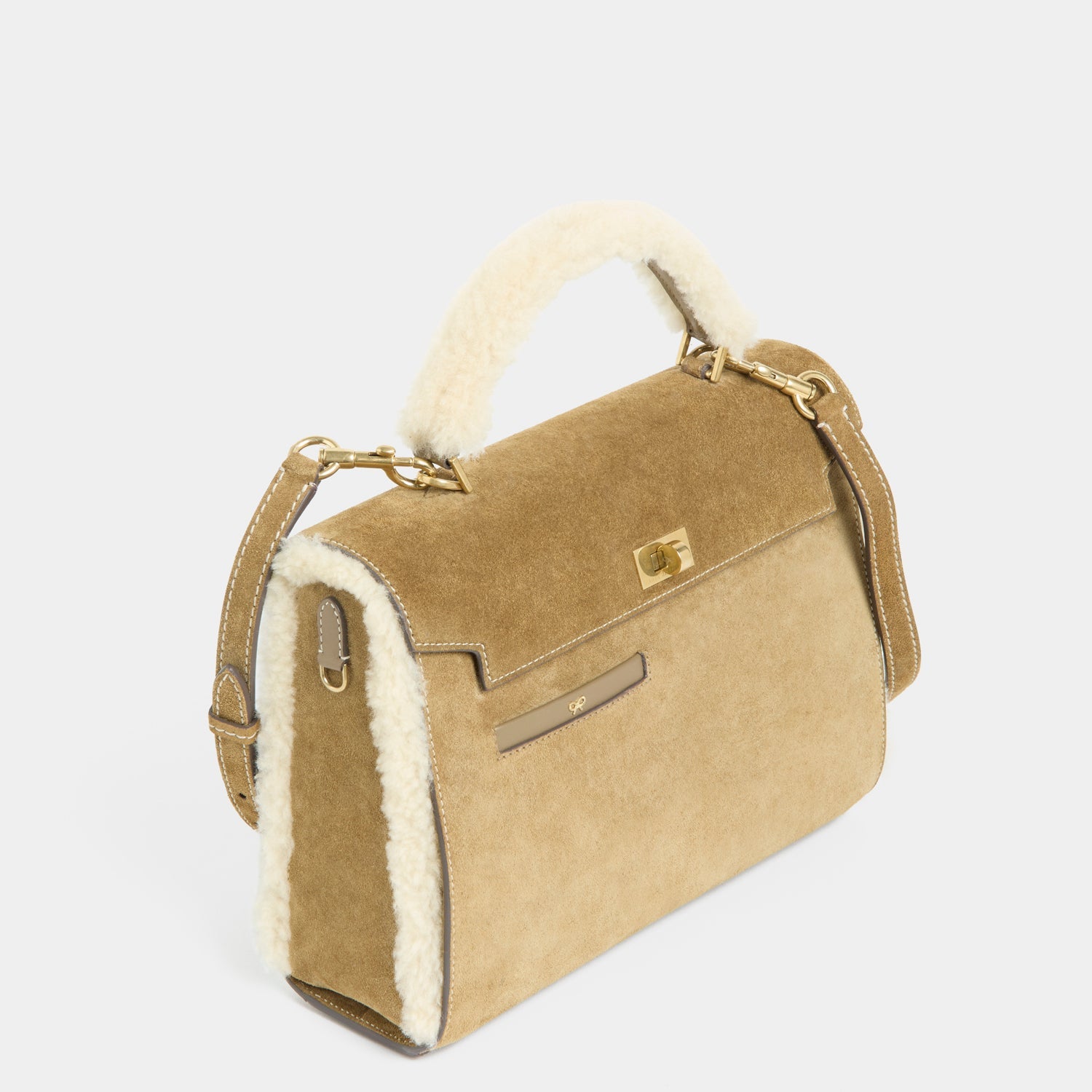 Mortimer Shearling Top Handle -

          
            Shearling/Suede Leather in Moutarde -
          

          Anya Hindmarch EU
