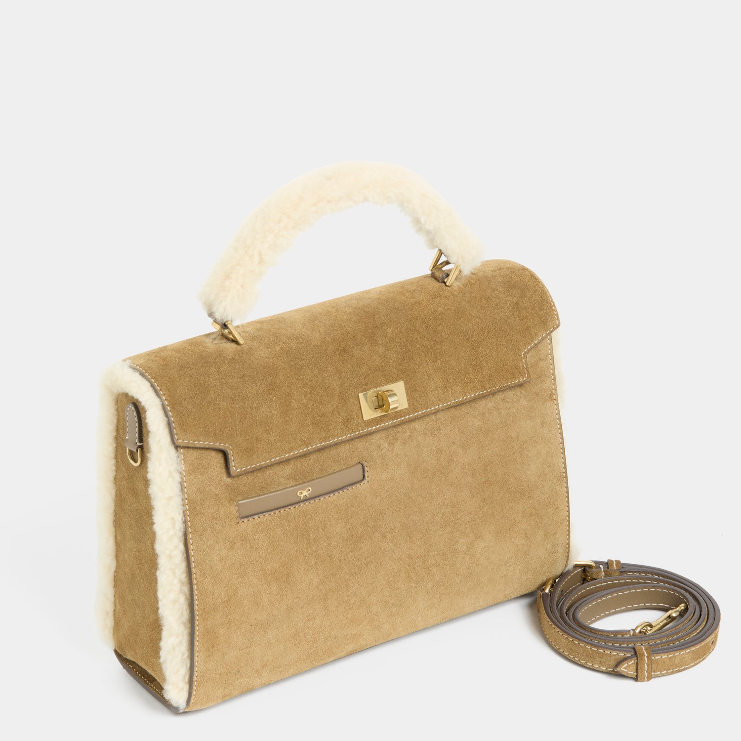 Mortimer Shearling Top Handle -

          
            Shearling/Suede Leather in Moutarde -
          

          Anya Hindmarch EU
