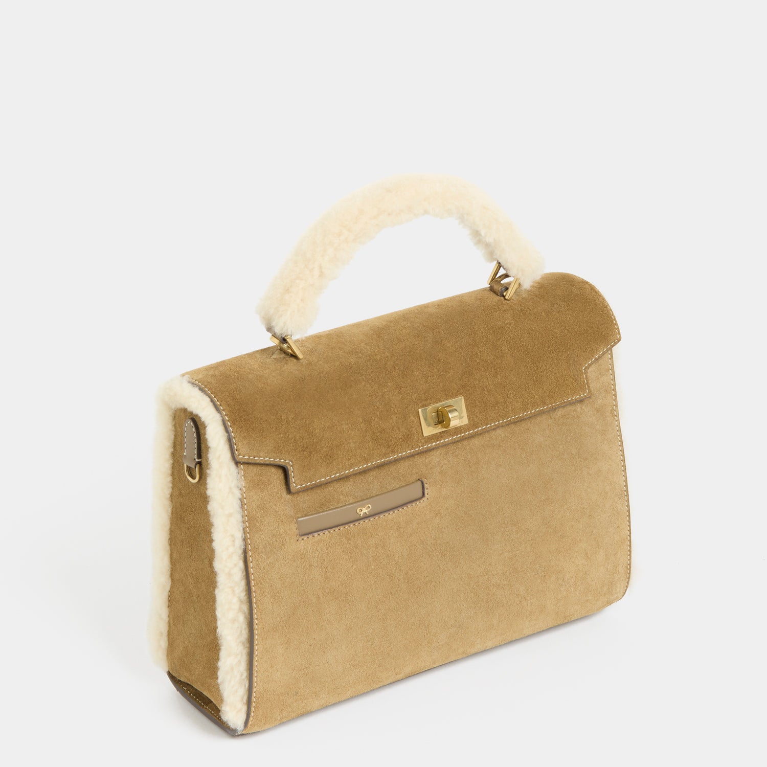 Mortimer Shearling Top Handle -

          
            Shearling/Suede Leather in Moutarde -
          

          Anya Hindmarch EU
