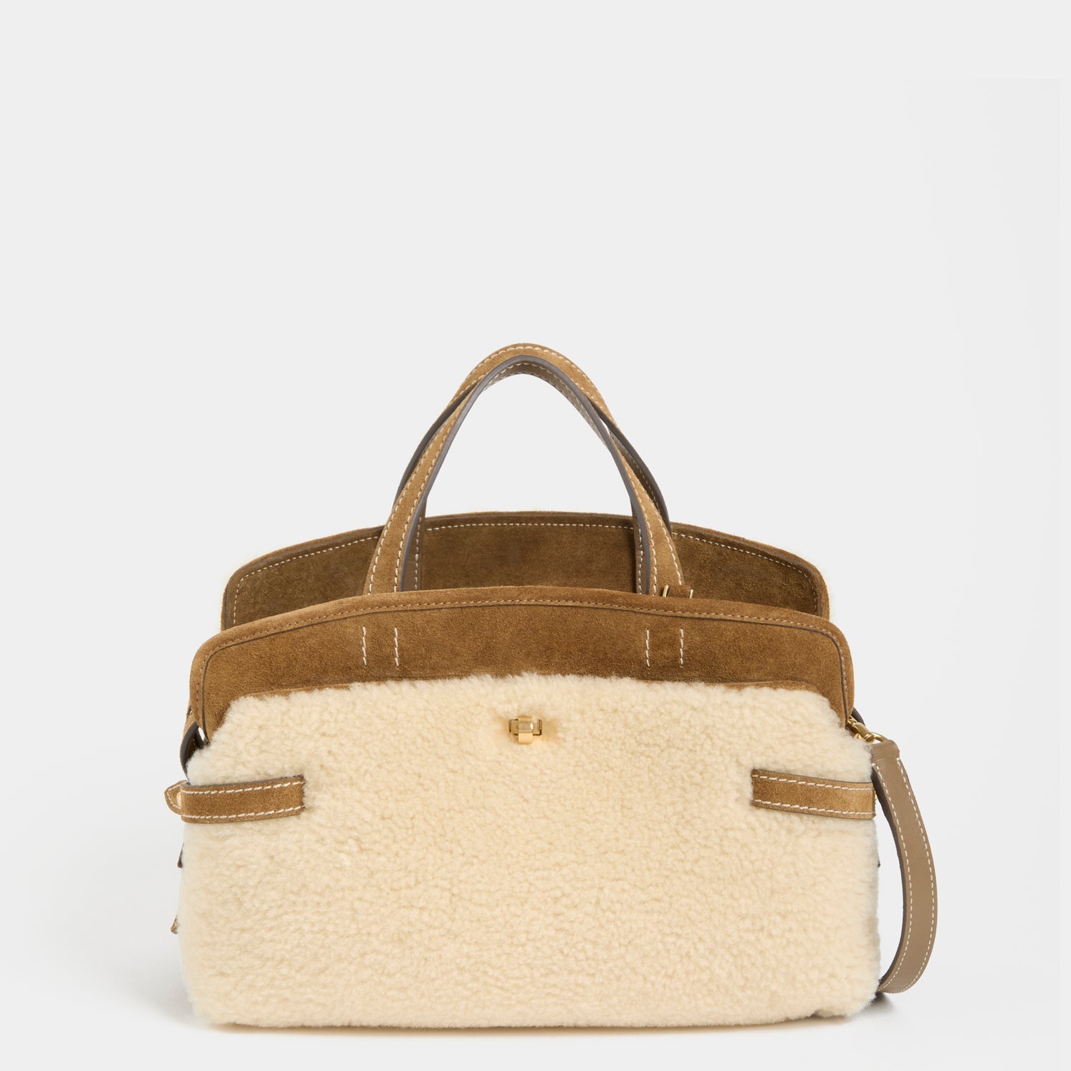 Wilson Shearling Cross-body -

          
            Shearling/Suede Leather in Moutarde -
          

          Anya Hindmarch EU
